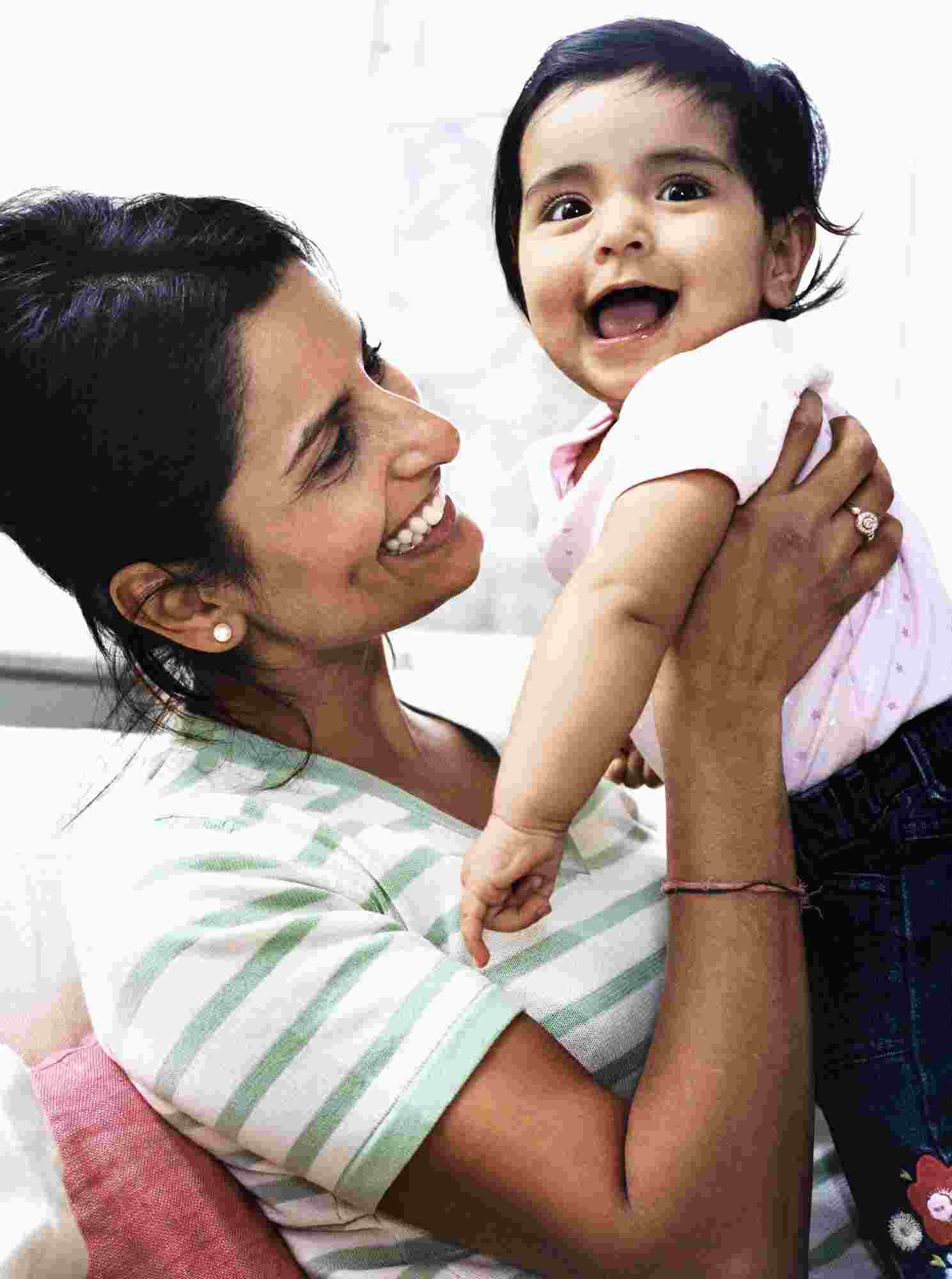 Mommy holding child Mommy holding child