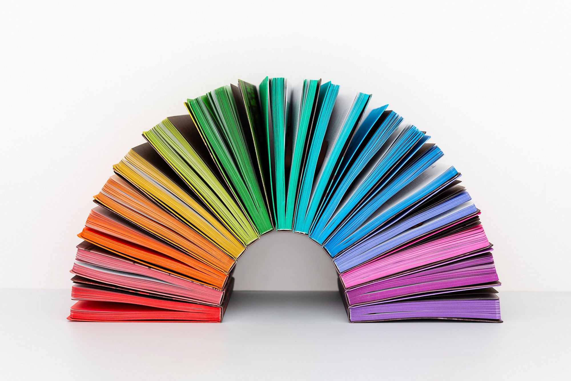 Colorful Books Shaped into a Rainbow