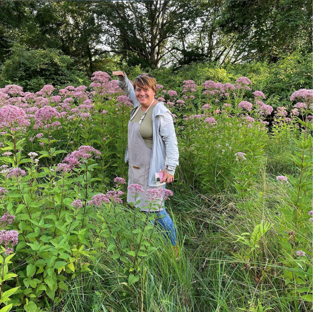 Child Reading a Book Outdoors in the Fall