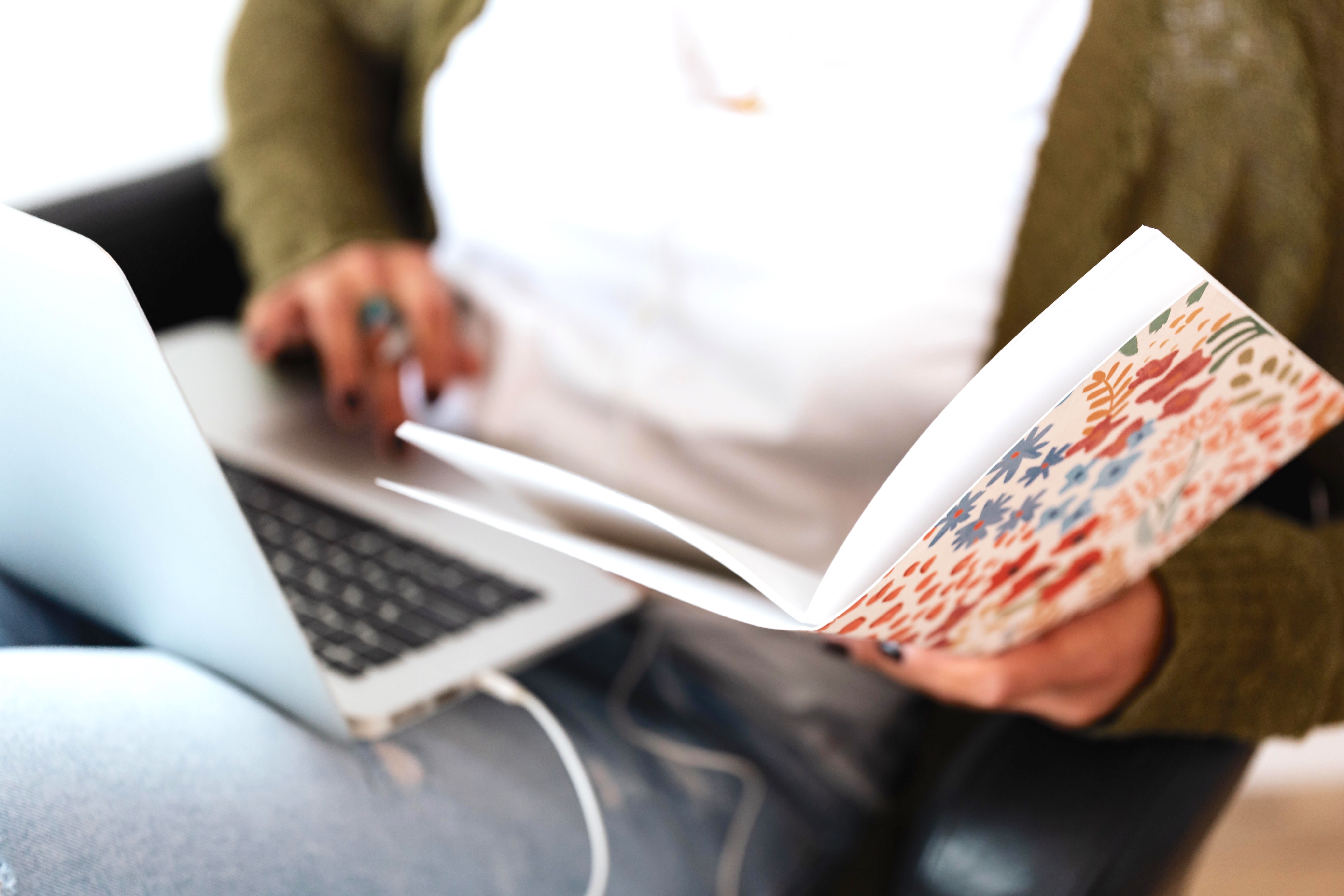 Crop Woman Working on Laptop and Notebook