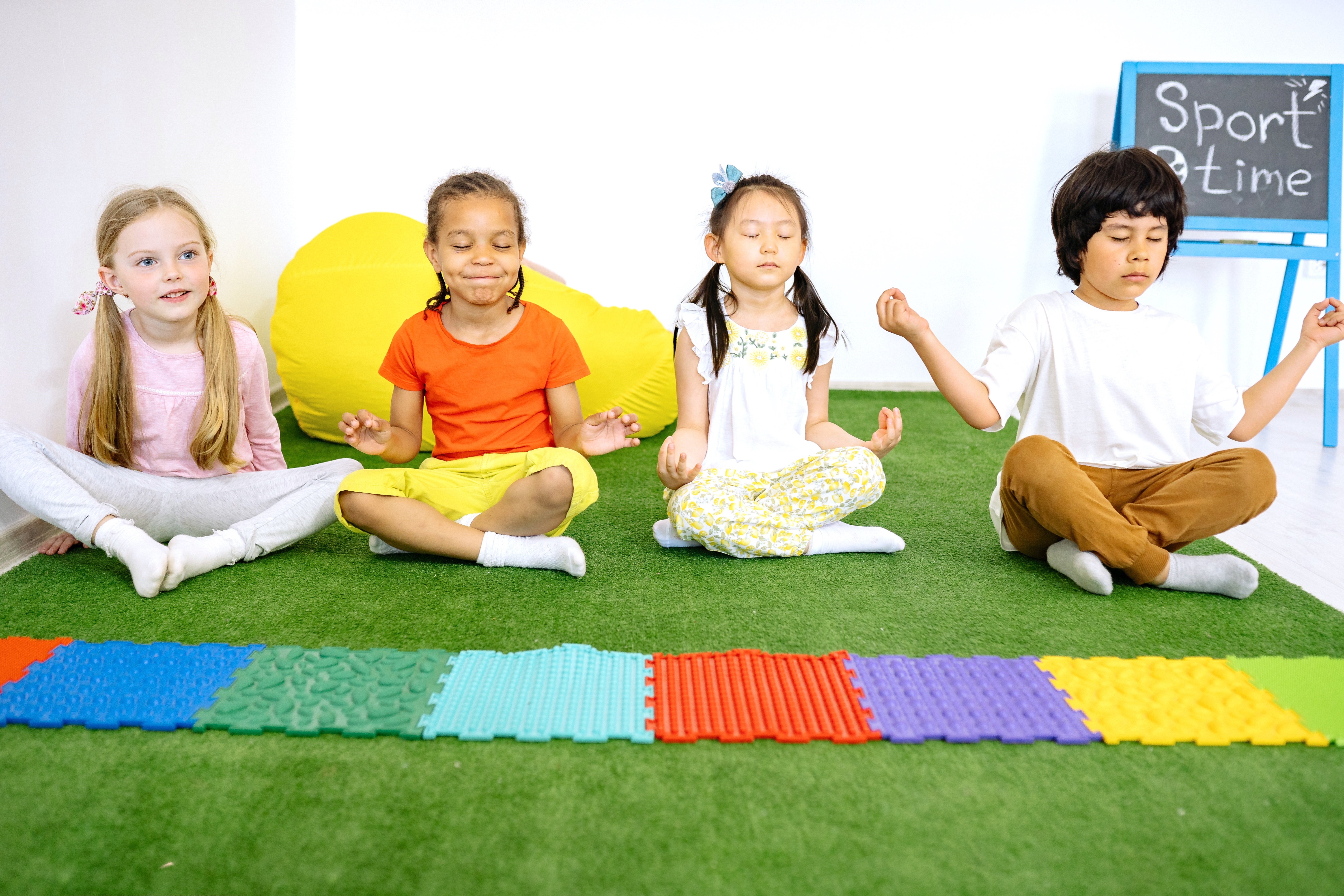 Group of Kids Doing Yoga Together