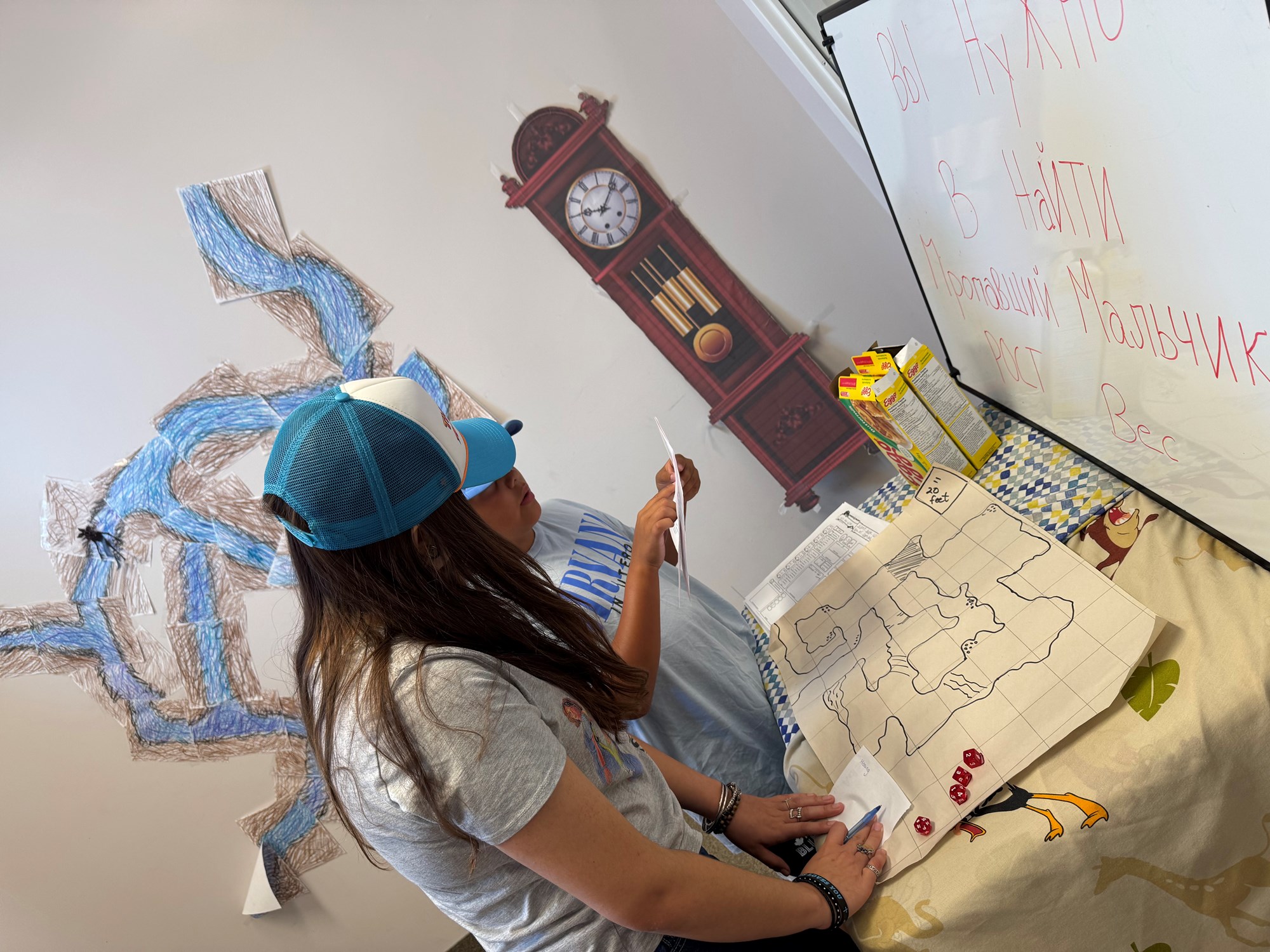 Two people working on solving the Stranger Things Escape room in Dorchester.