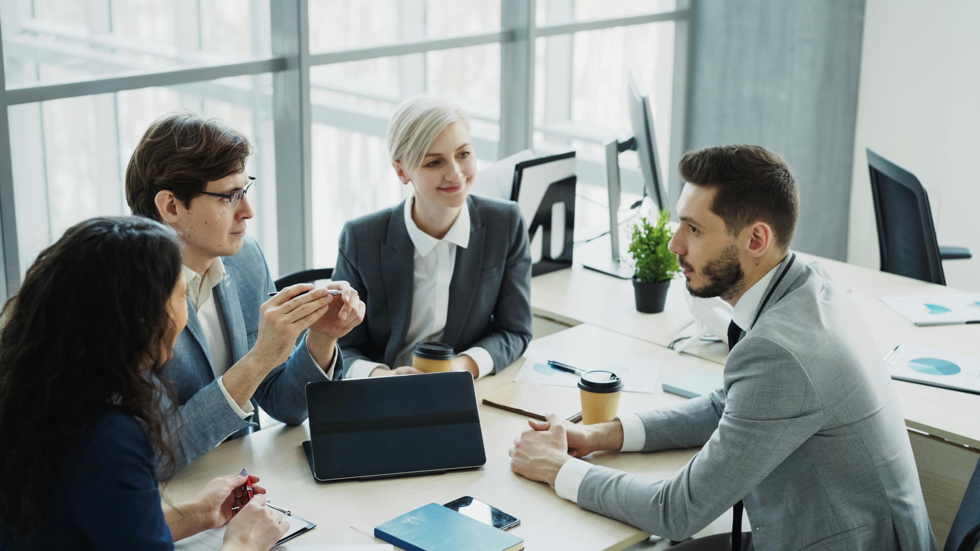 Professional Business Team Meeting in Modern Office