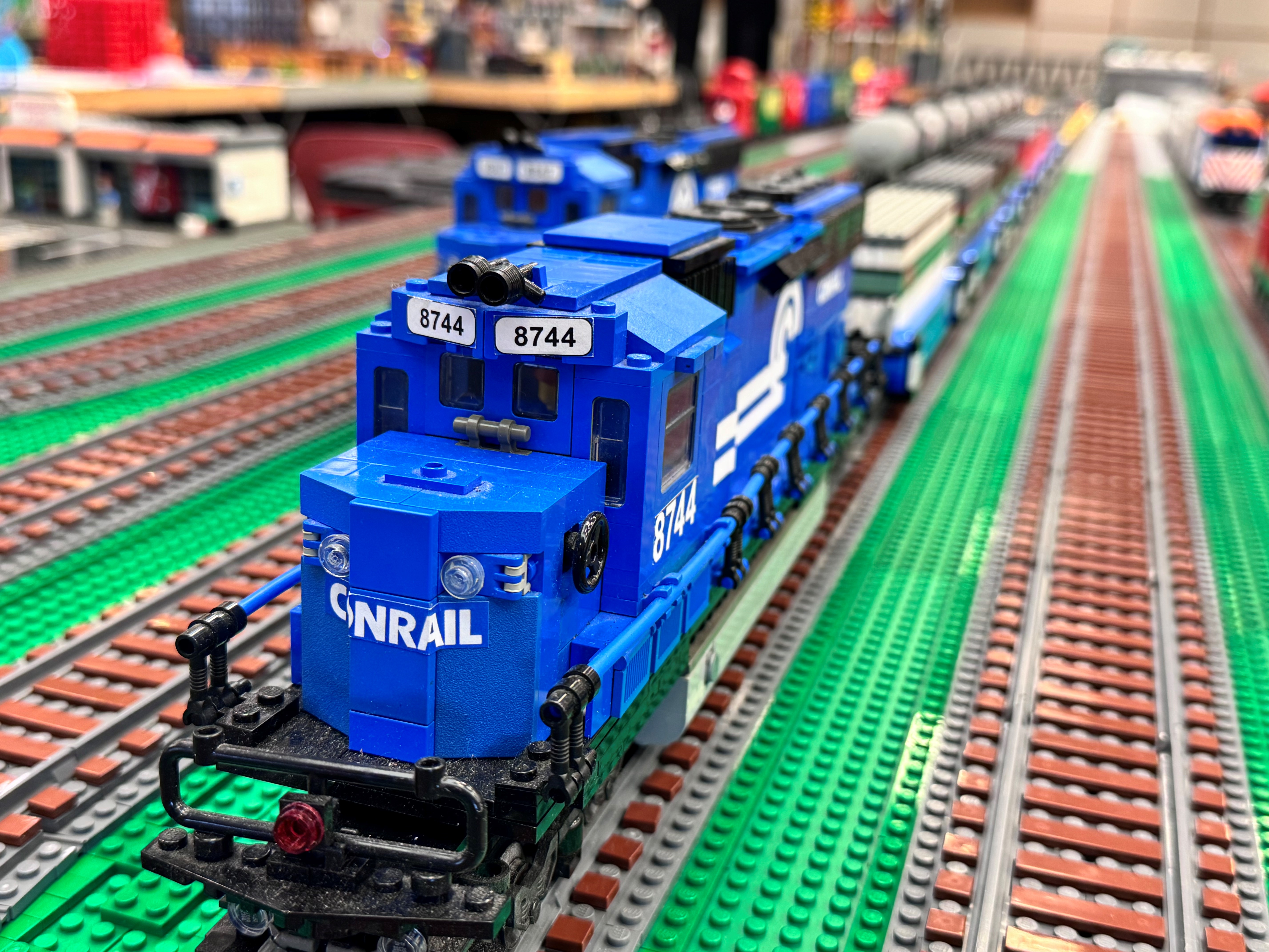 Train made of legos on a lego track