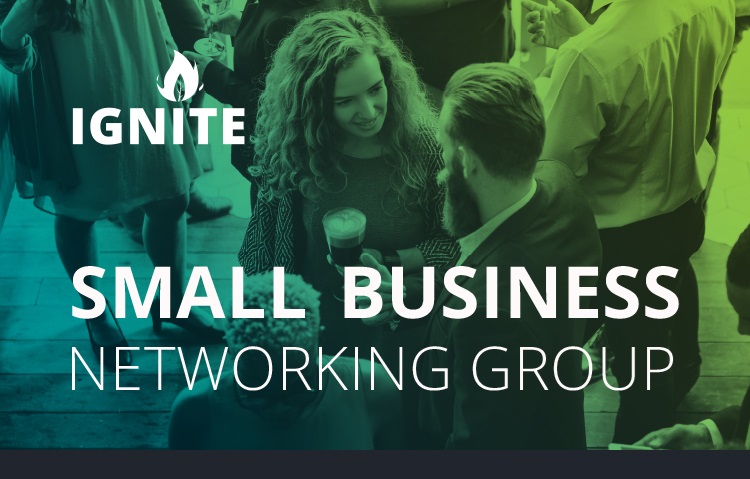 Two people talking at a networking event