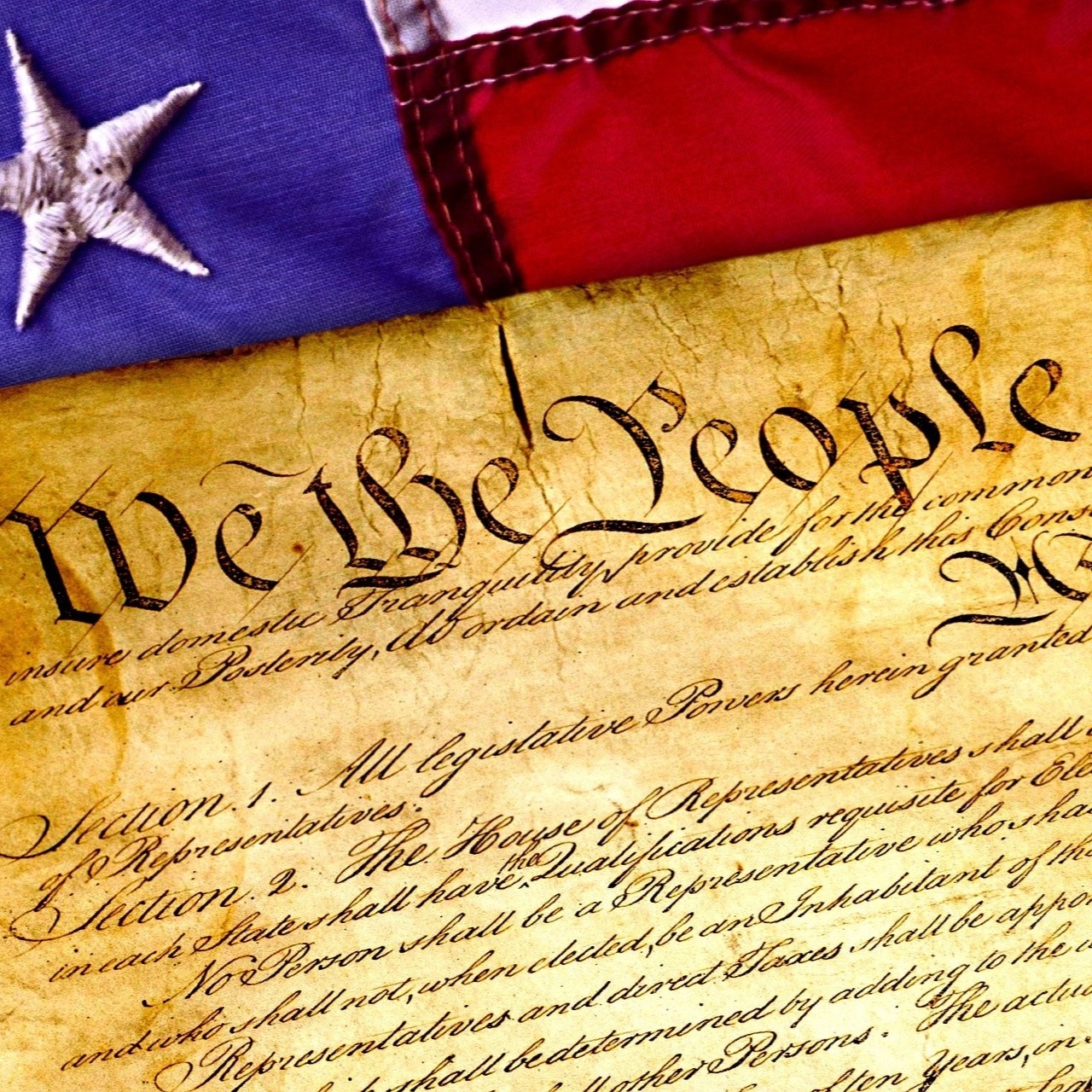 Portion of the Declaration of Independence document and early US flag