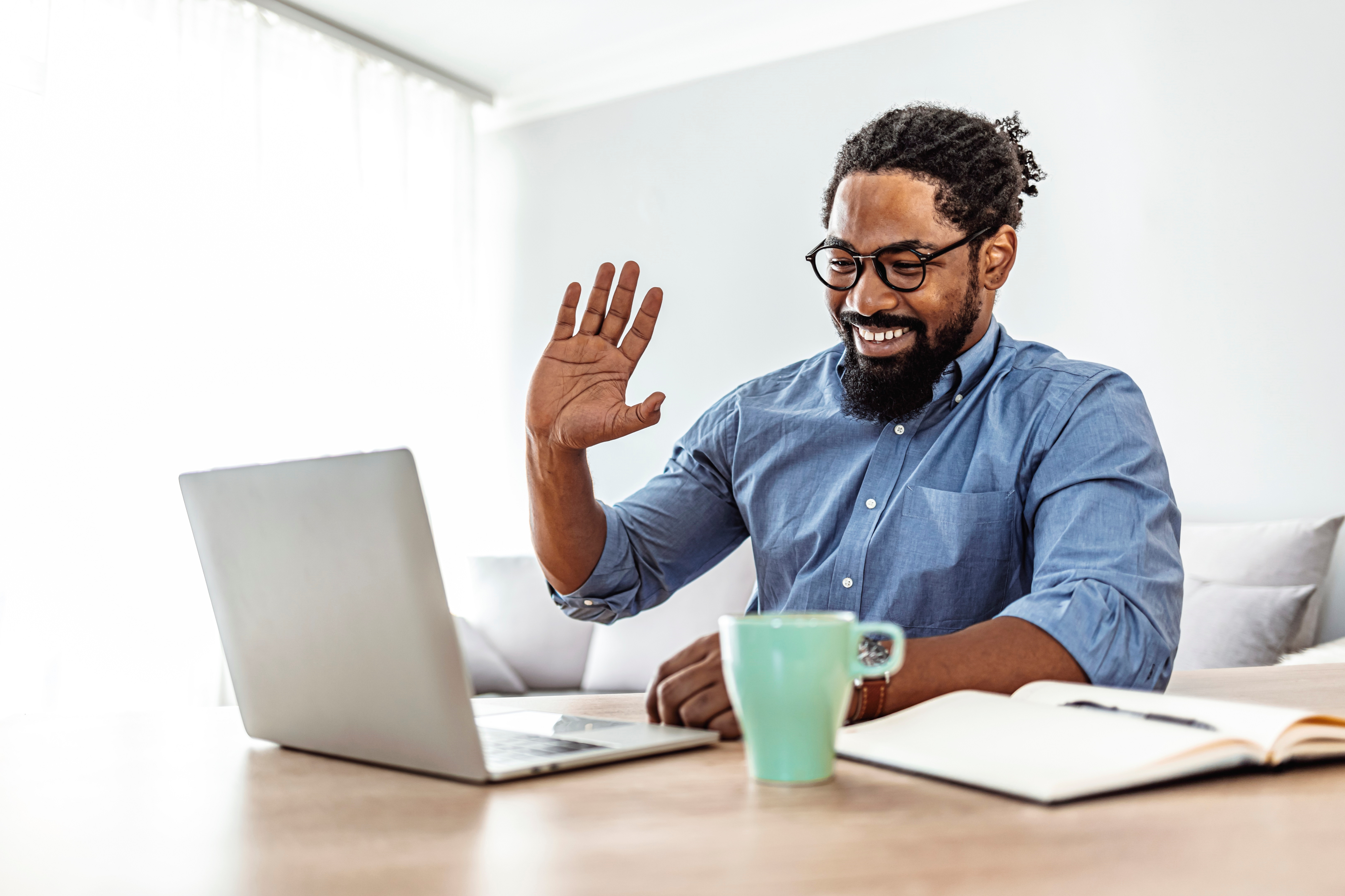 Businessman Video Calling On Laptop