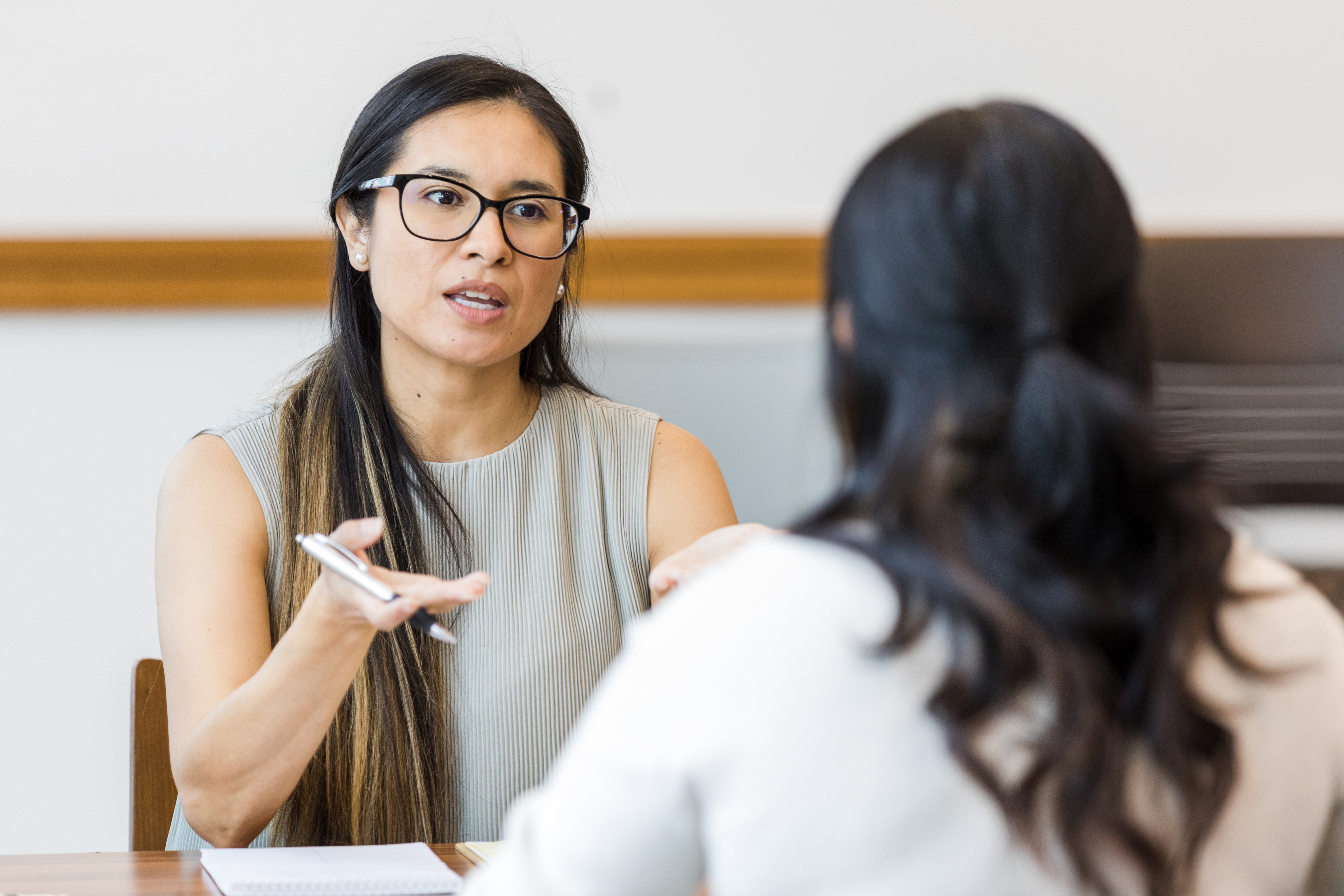 Mental Health Therapist Meets with her Client in the Conference Room