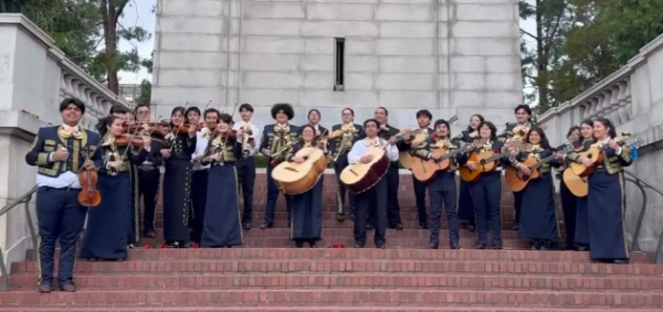Mariachi Luz de Oro standing on steps in front of the UC Berkeley Campanile
