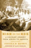 Cover of 'High on the Hog' with a group of people sitting around a table outdoors.