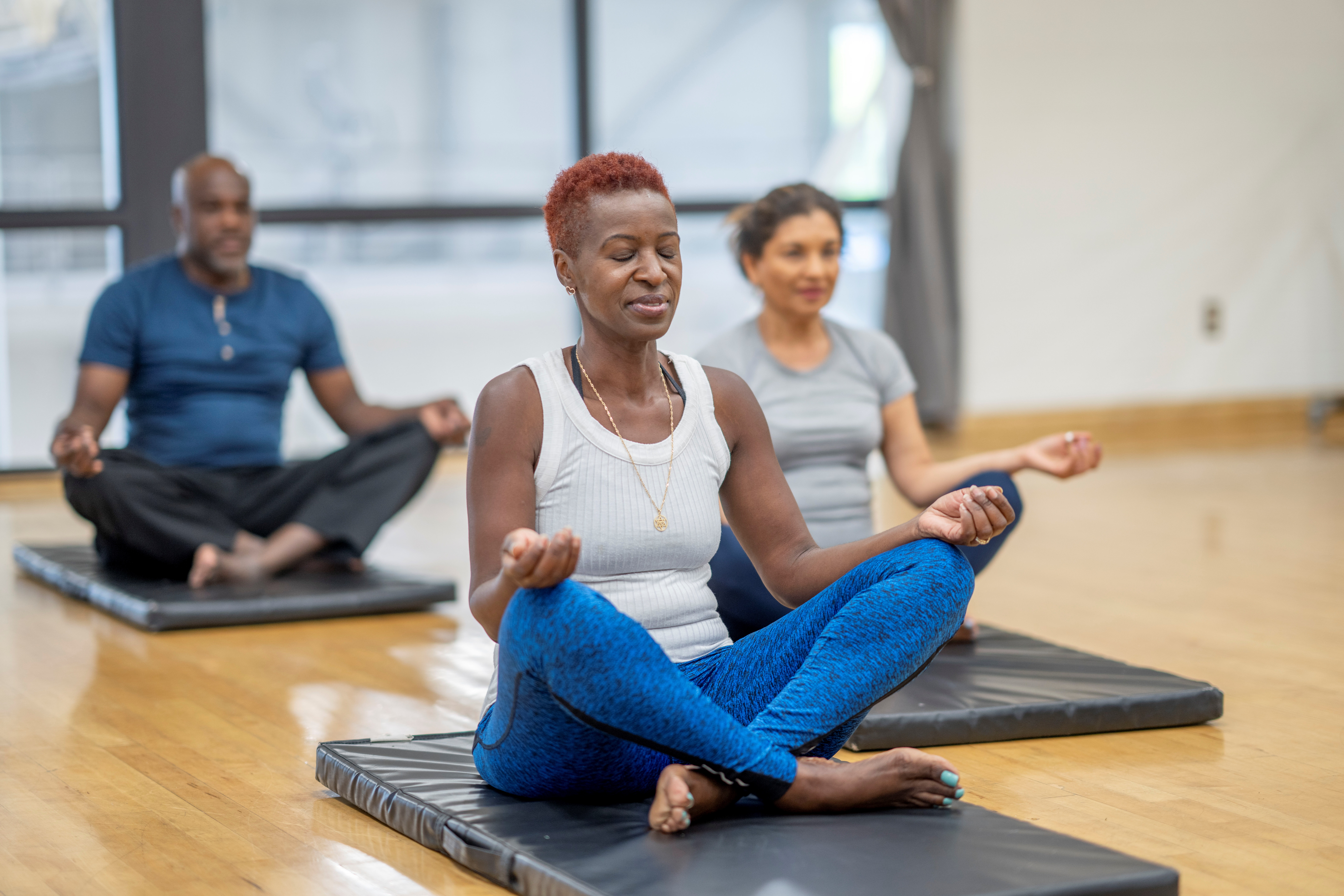 Group of Adults in a Yoga Meditation Class