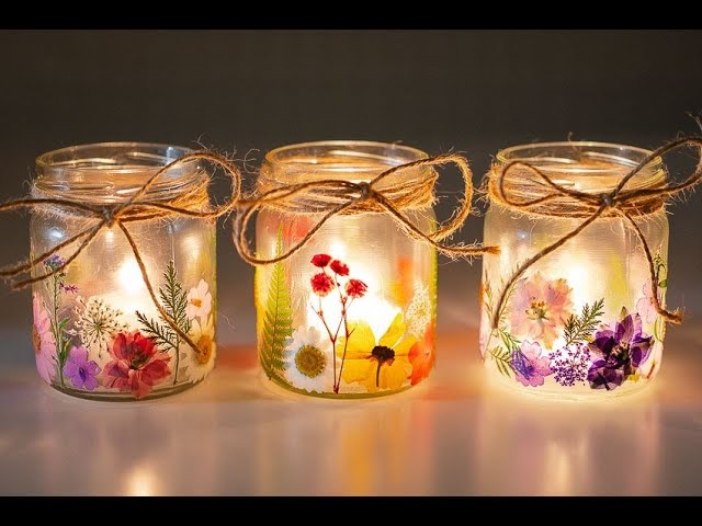 Tiny jars with lights and flowers
