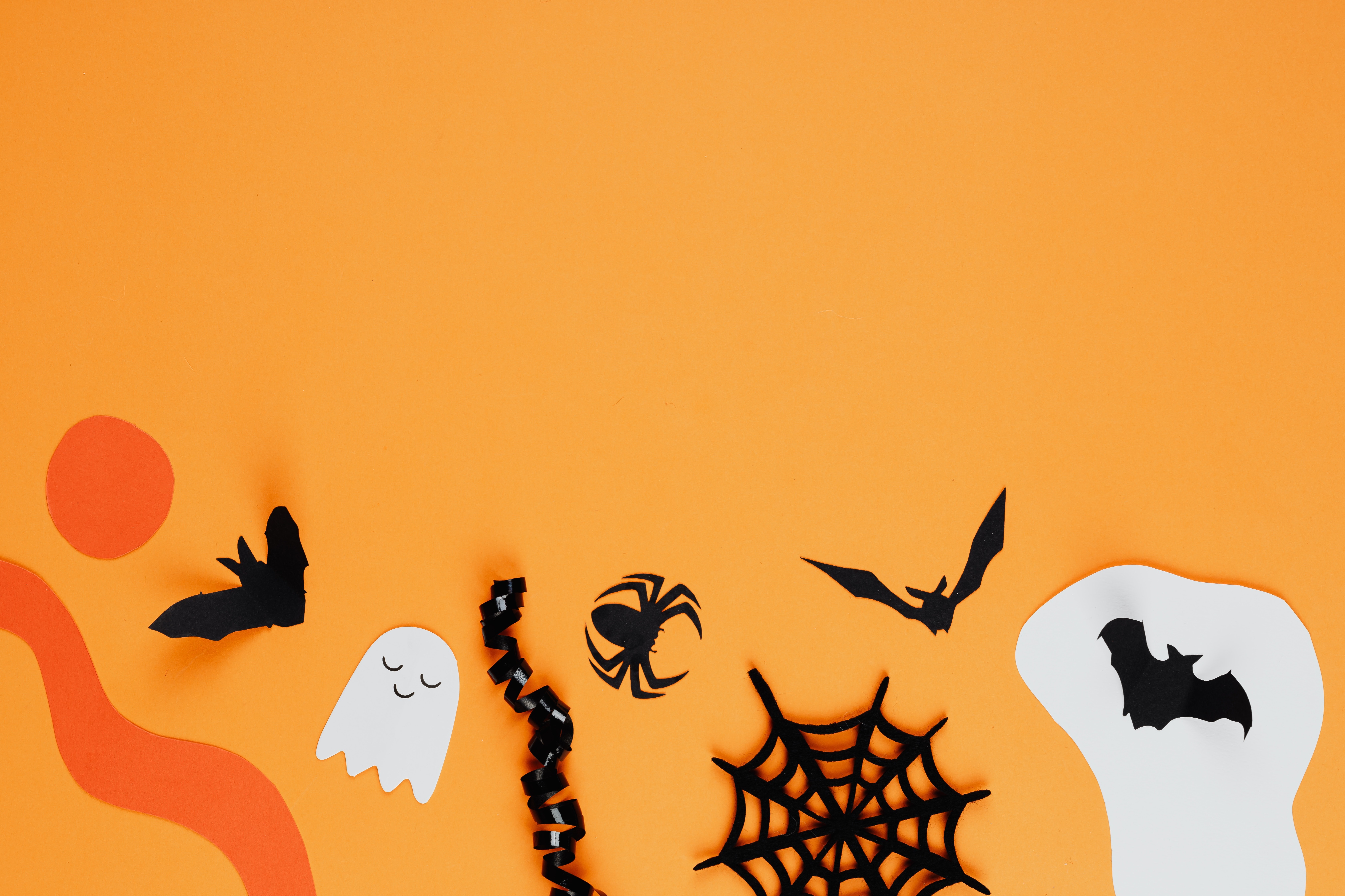 Halloween Decorations on an Orange Background