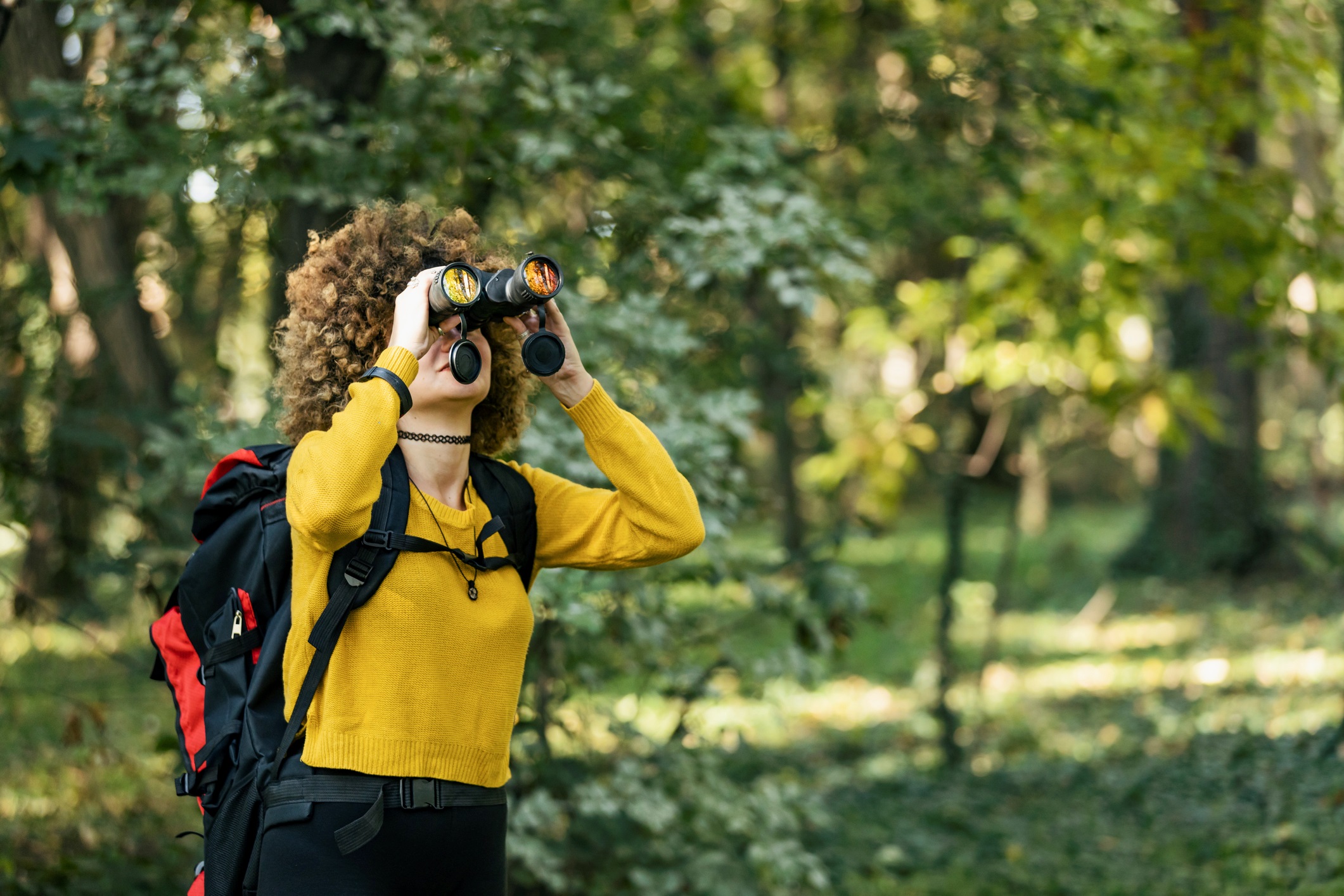 Woman Looking Through Binoculars