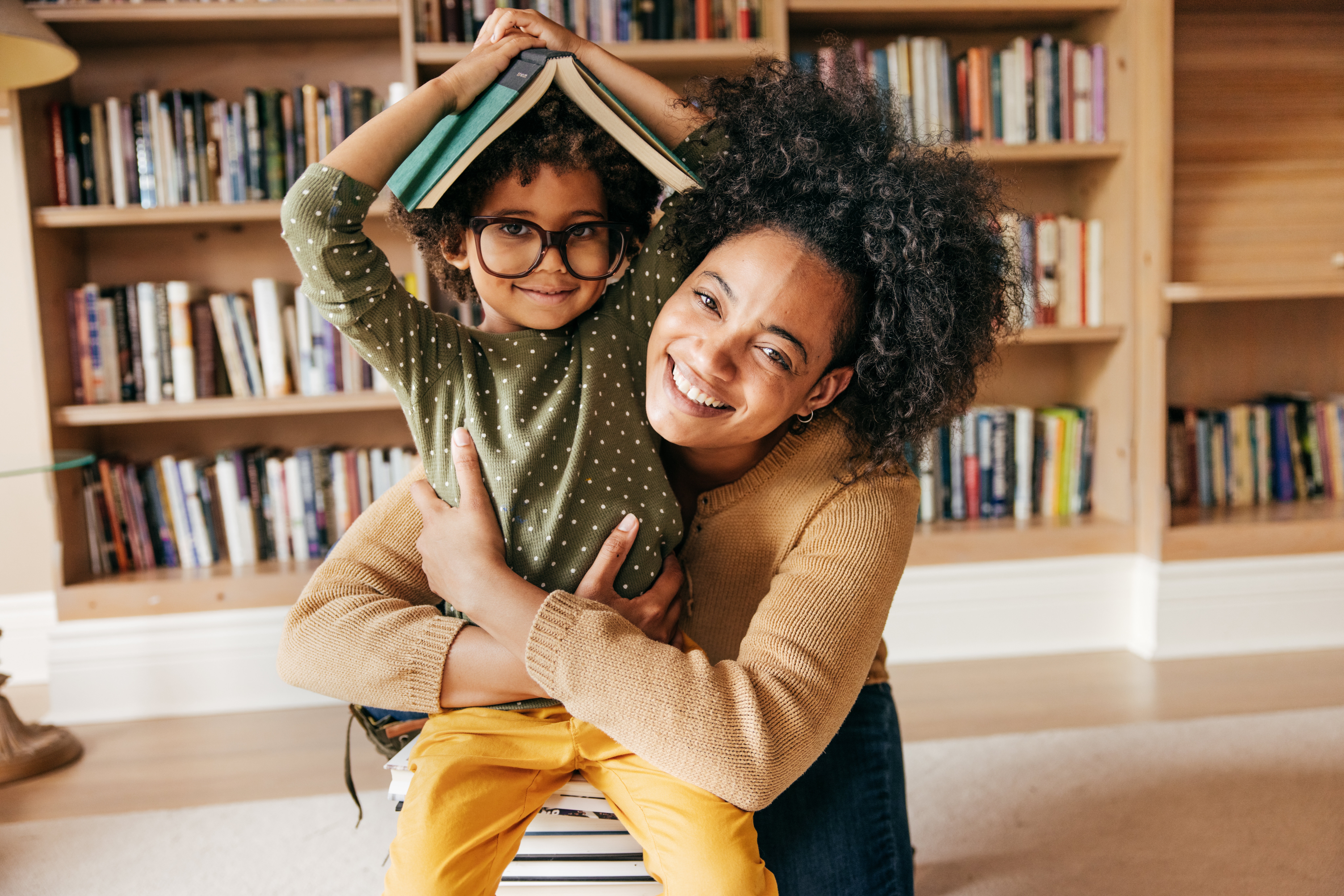 Mom Hugging Her Child and Posing with Books