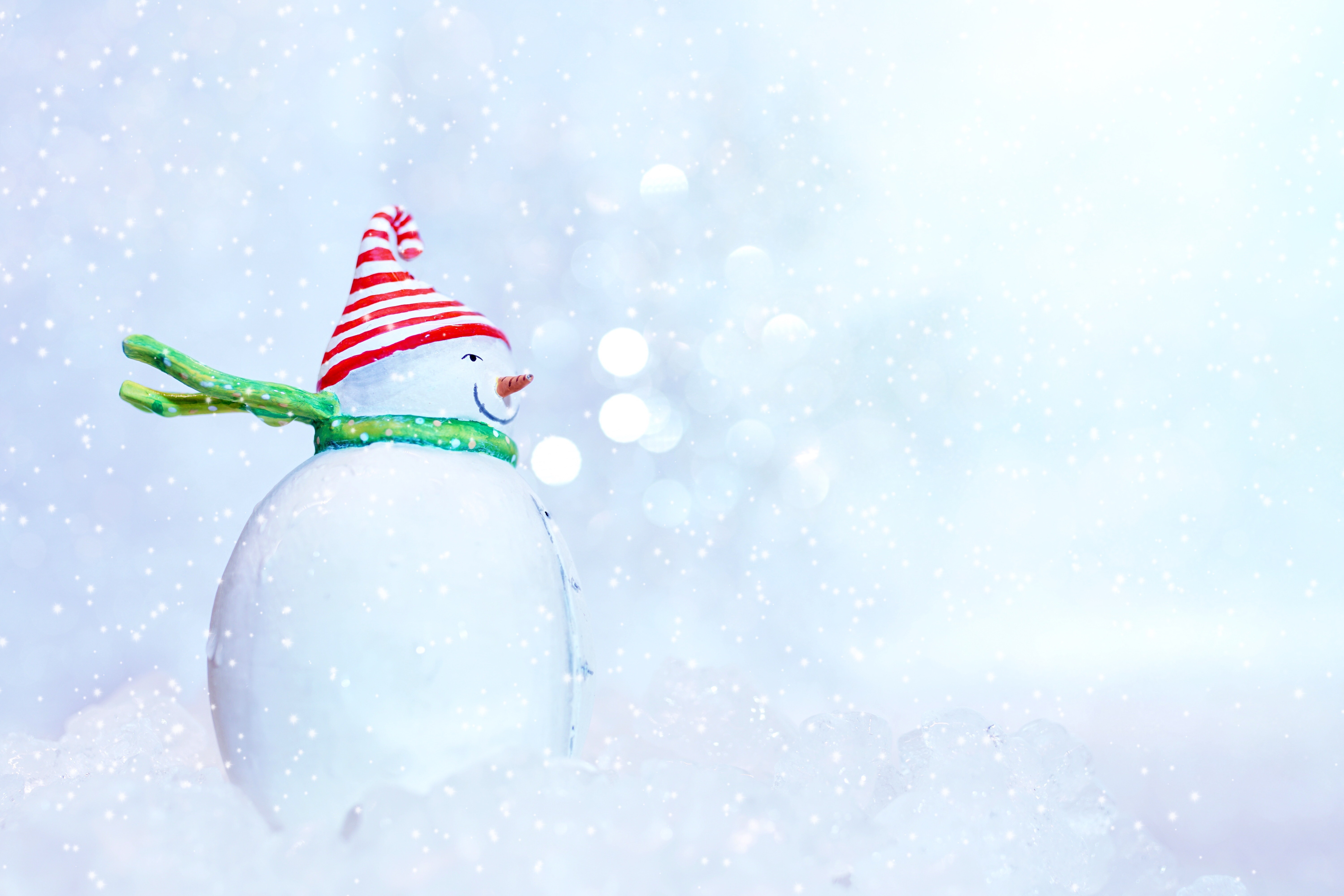 Snowman on a White Snowy Background