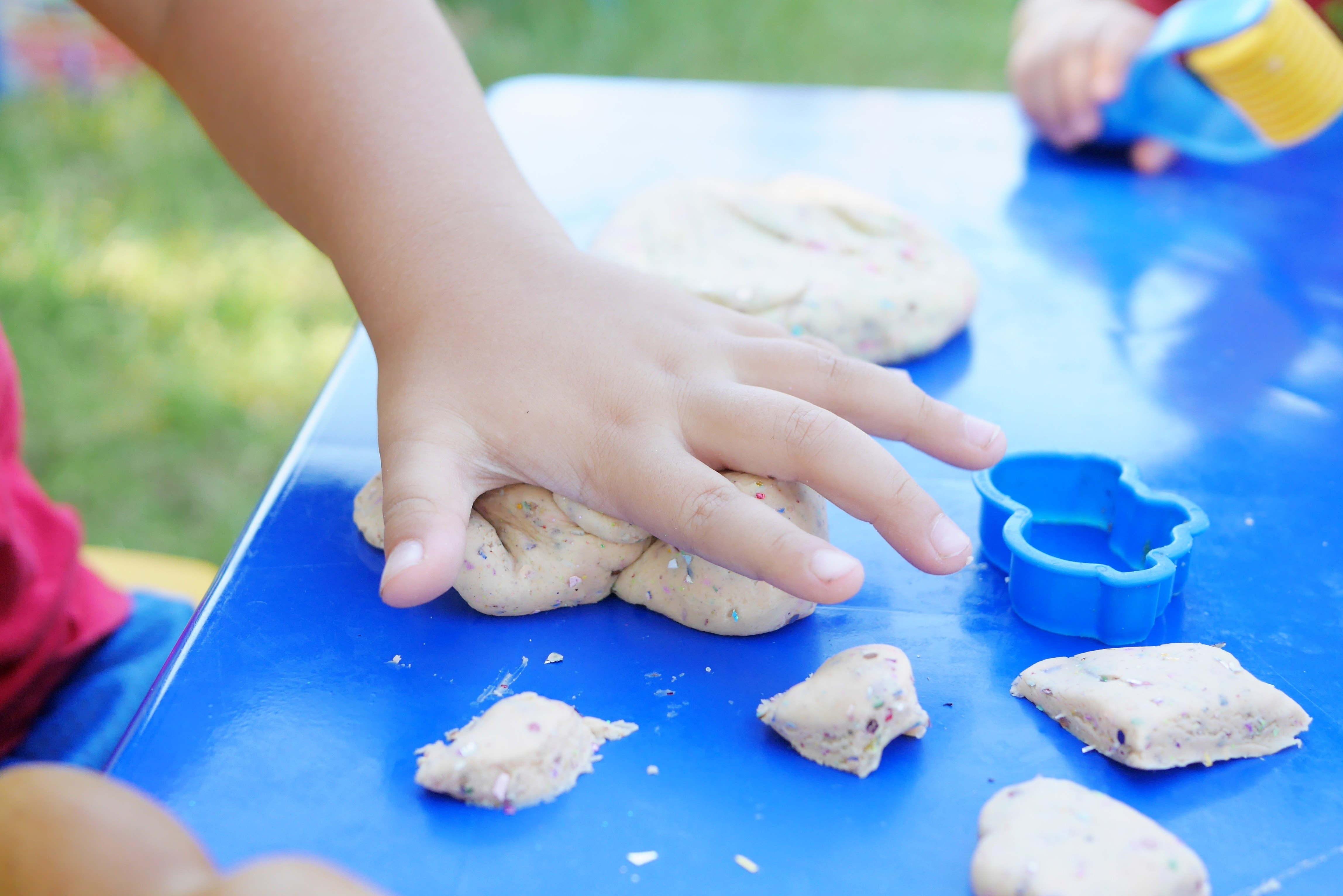 Child Playing with Play Dough