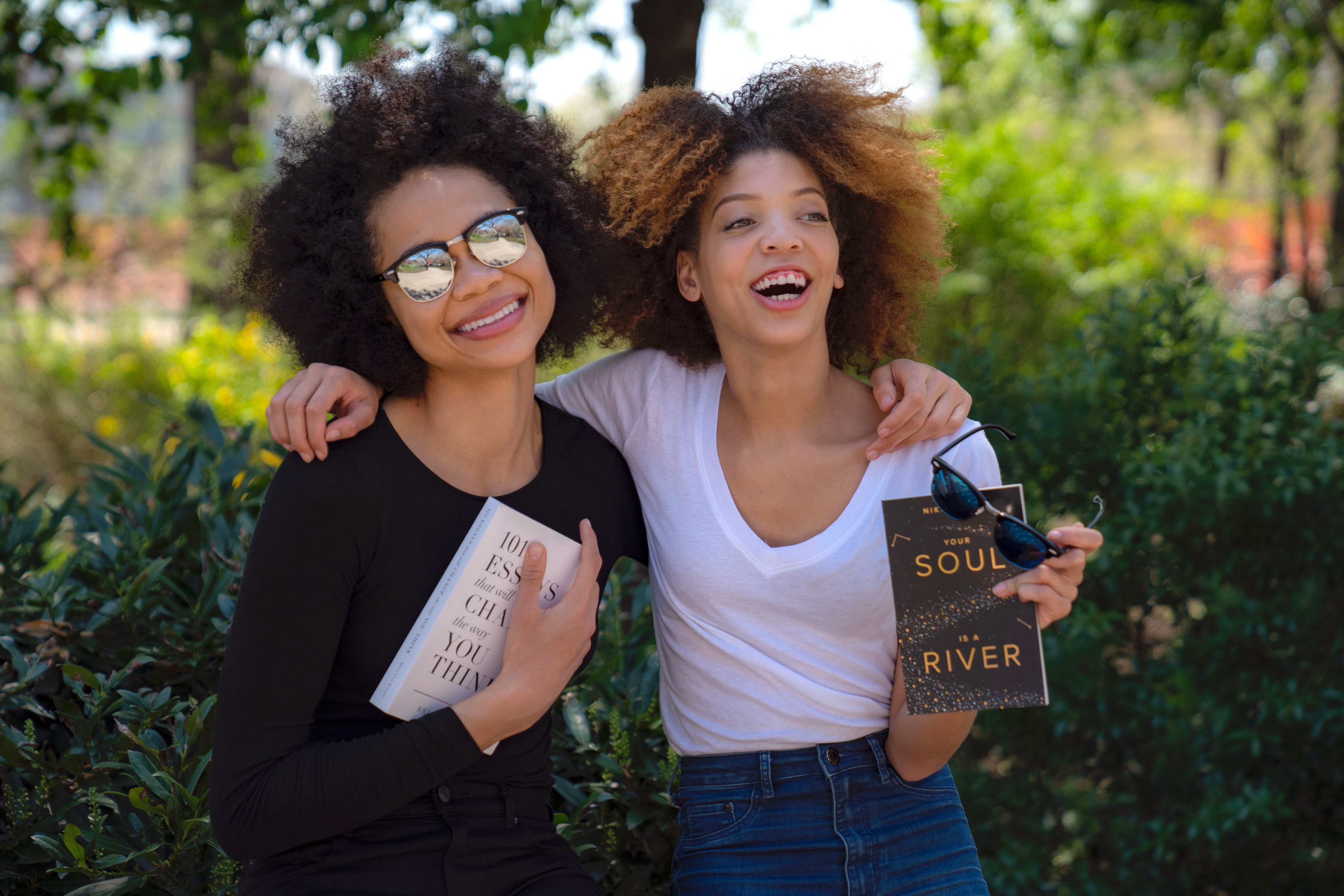 Teens Holding Books