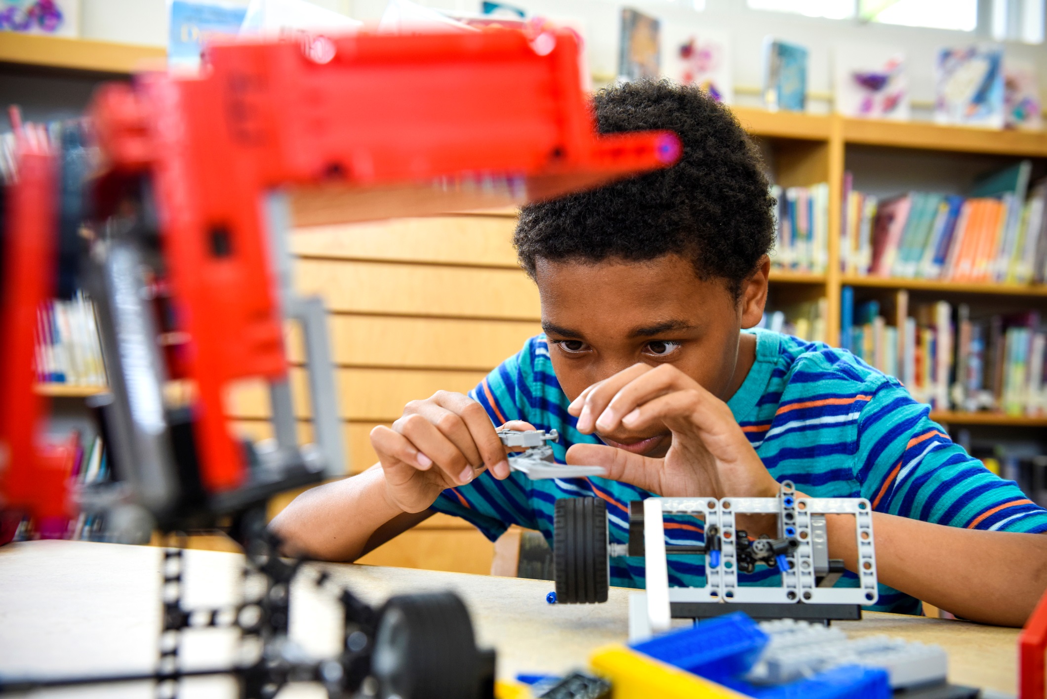 Boy Assembling Blocks at the Library