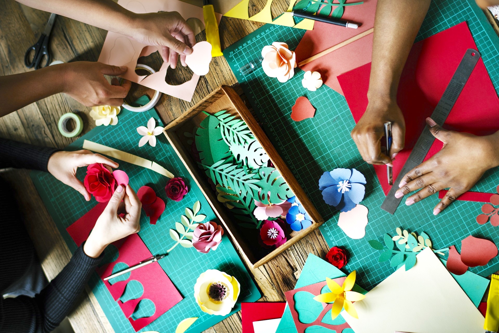 Adults paper crafts arts cutting origami table friends