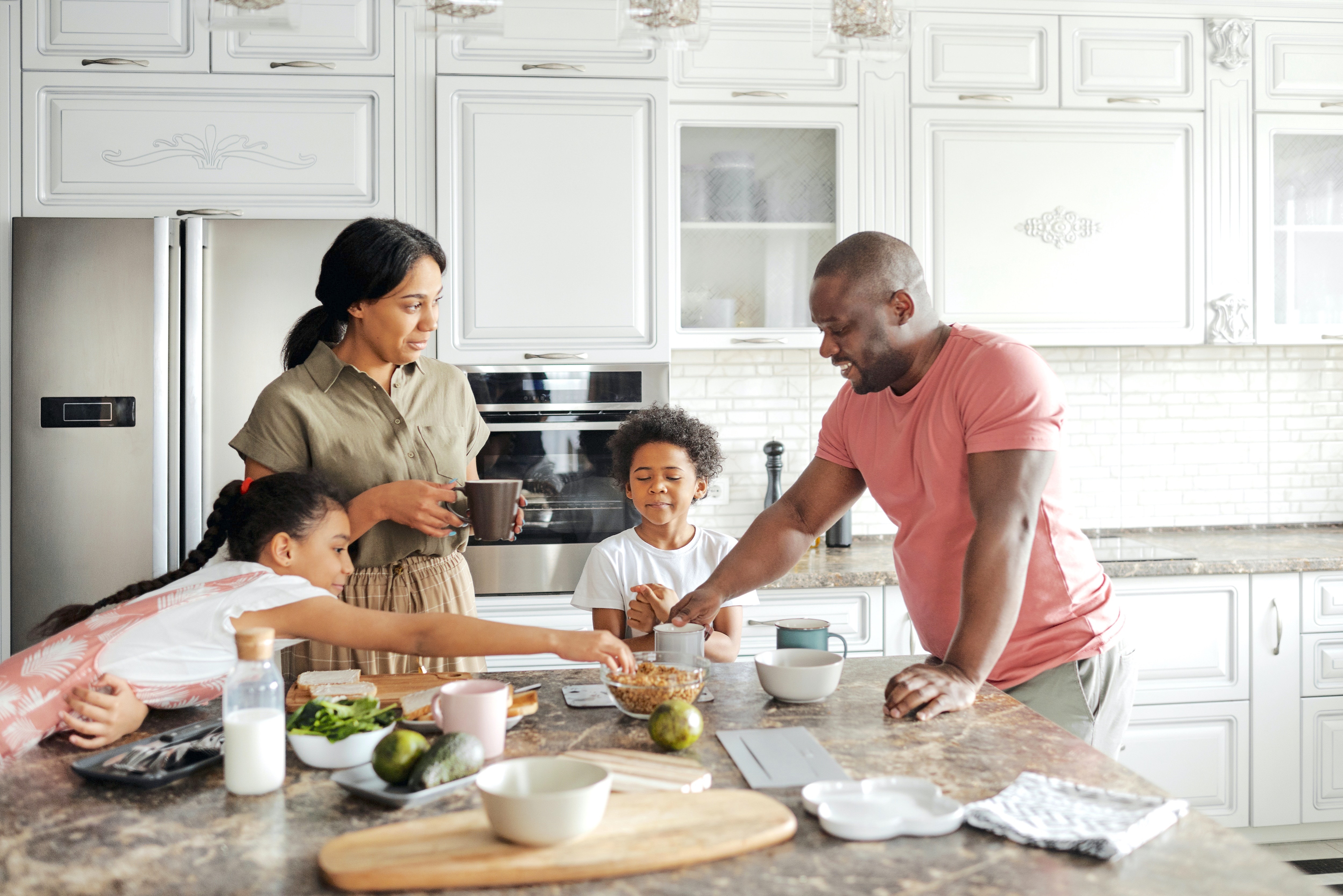 Family Cooking Together in a Kitchen