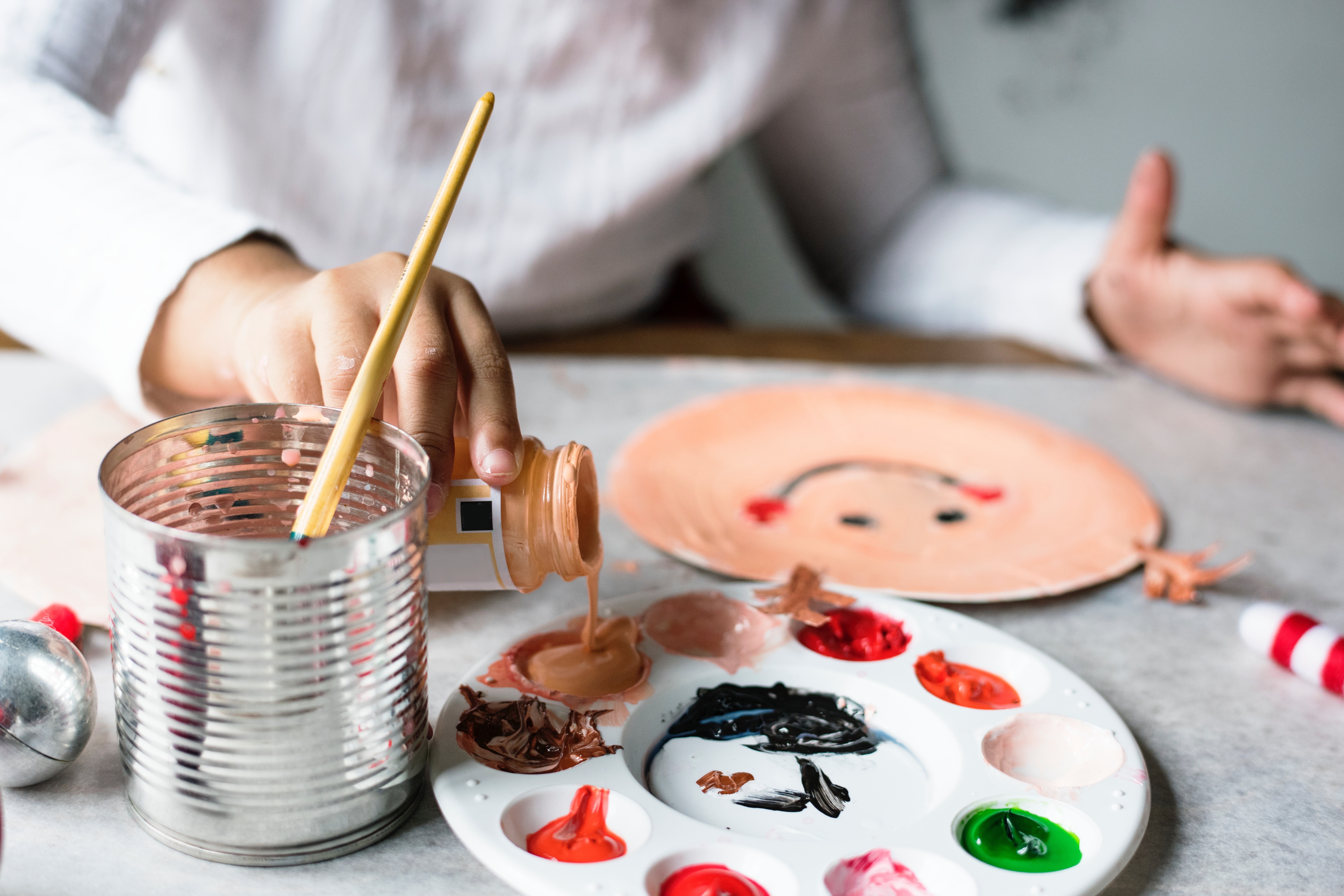 Kids painting a Winter Craft