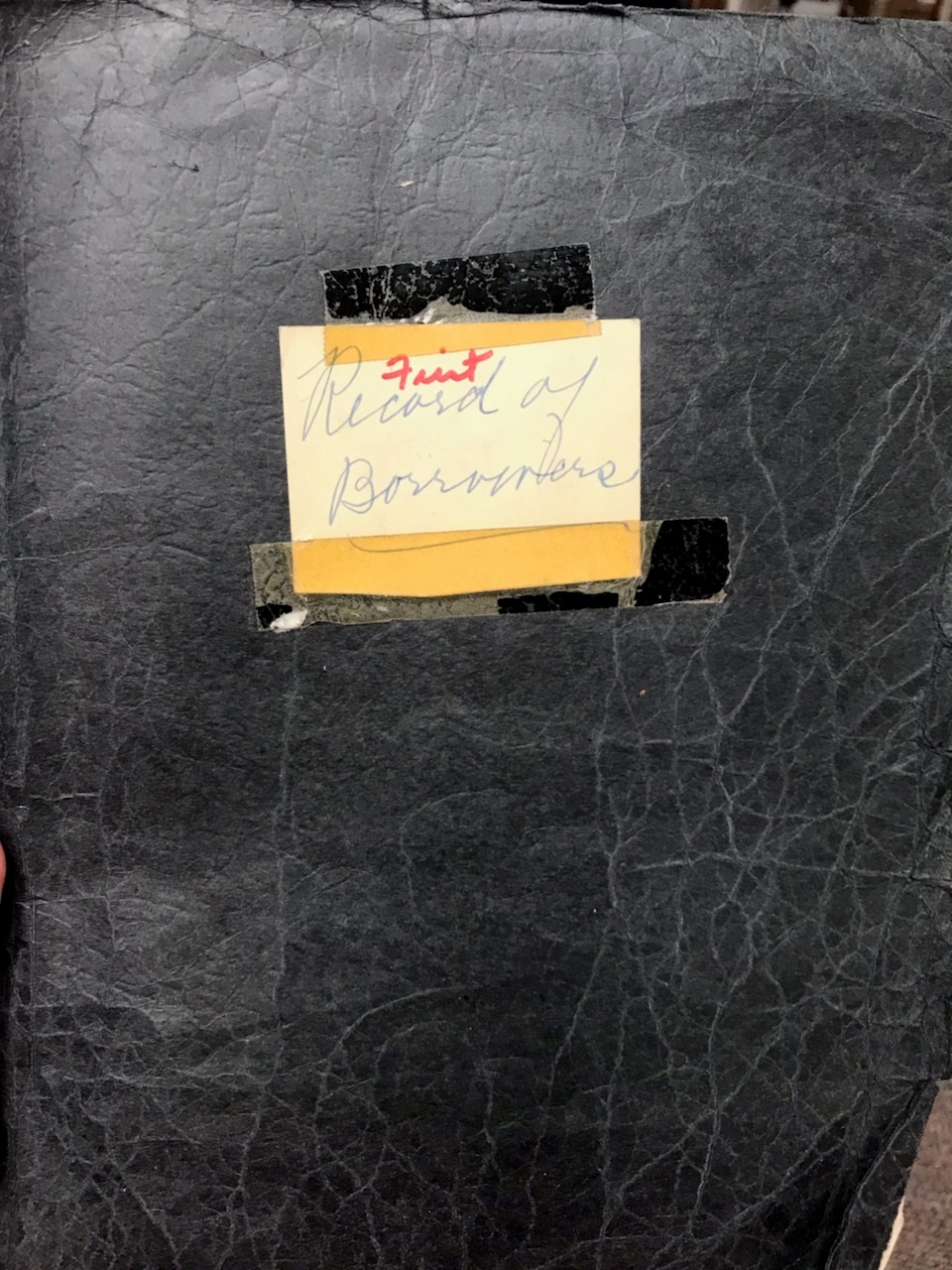 Notebook of library's first borrowers. 