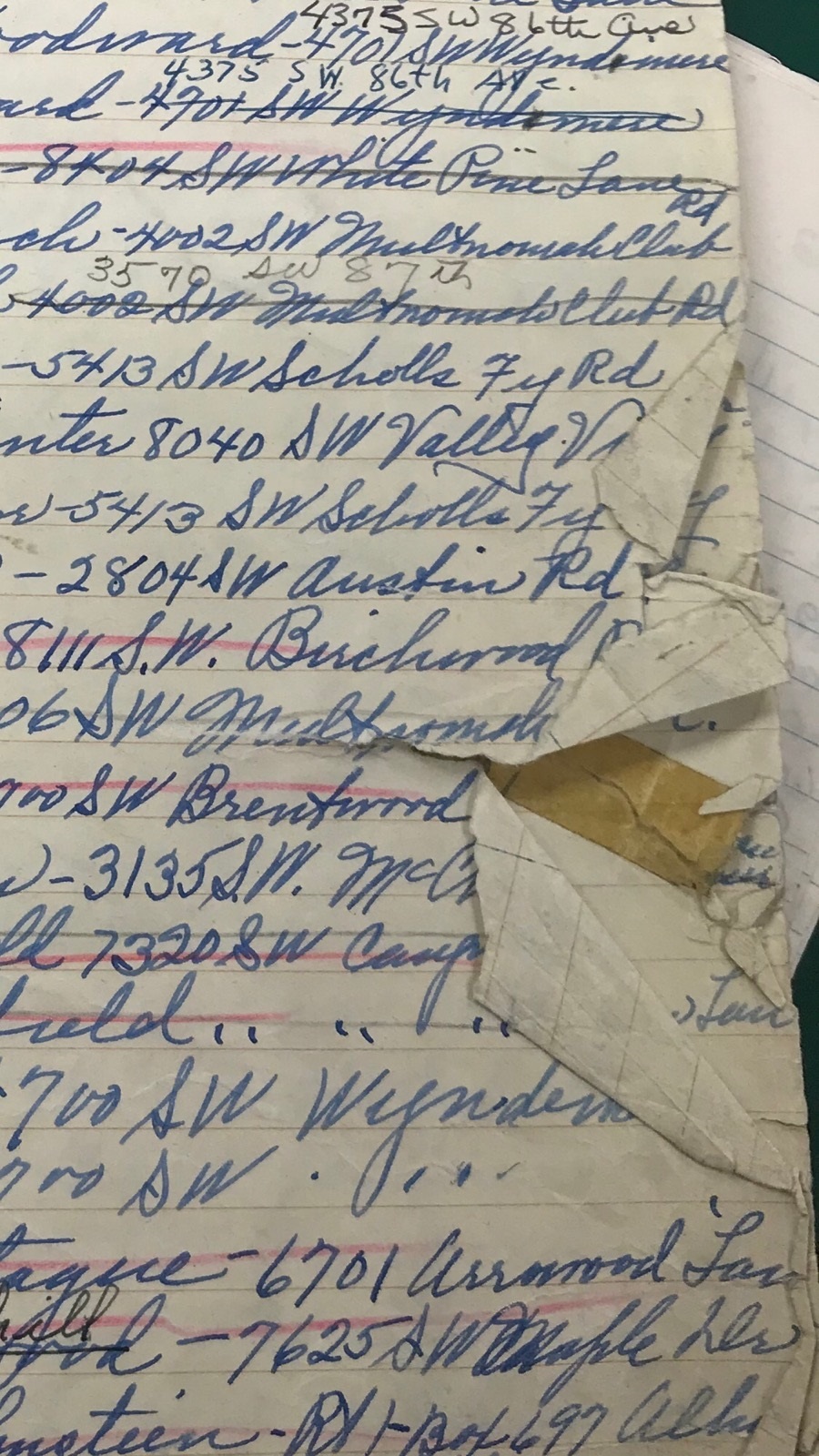 Close up of notebook of library's first borrowers. 