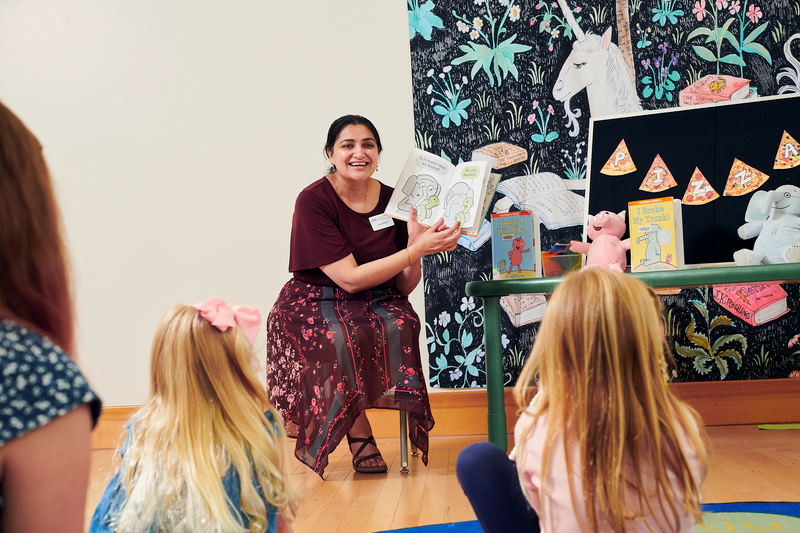 Librarian reading to children 