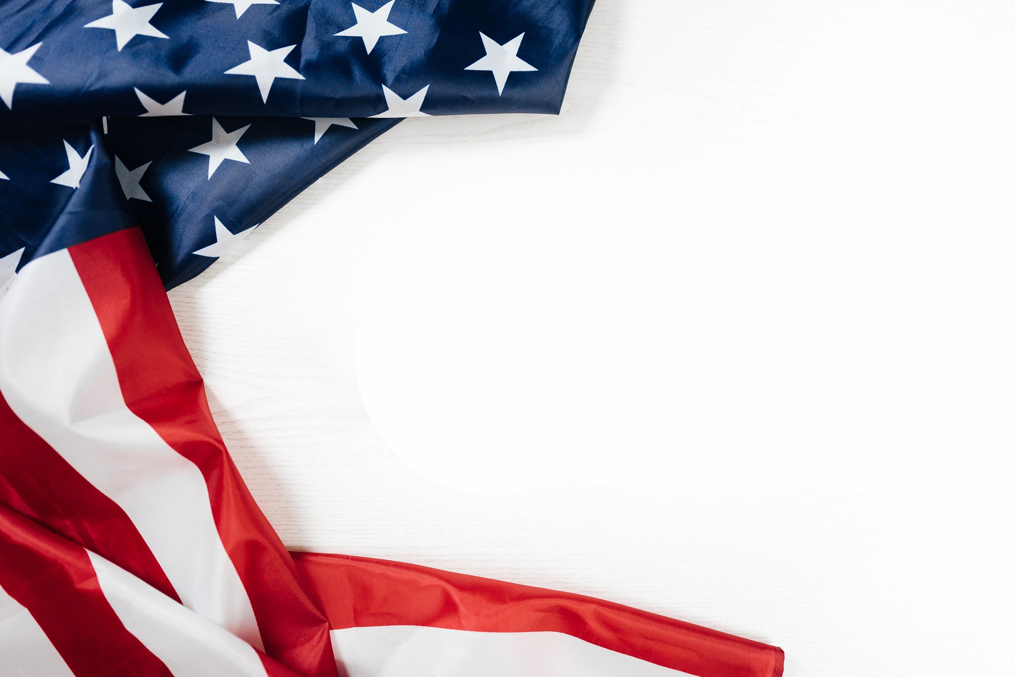 American Flag on Side of White Background.jpeg