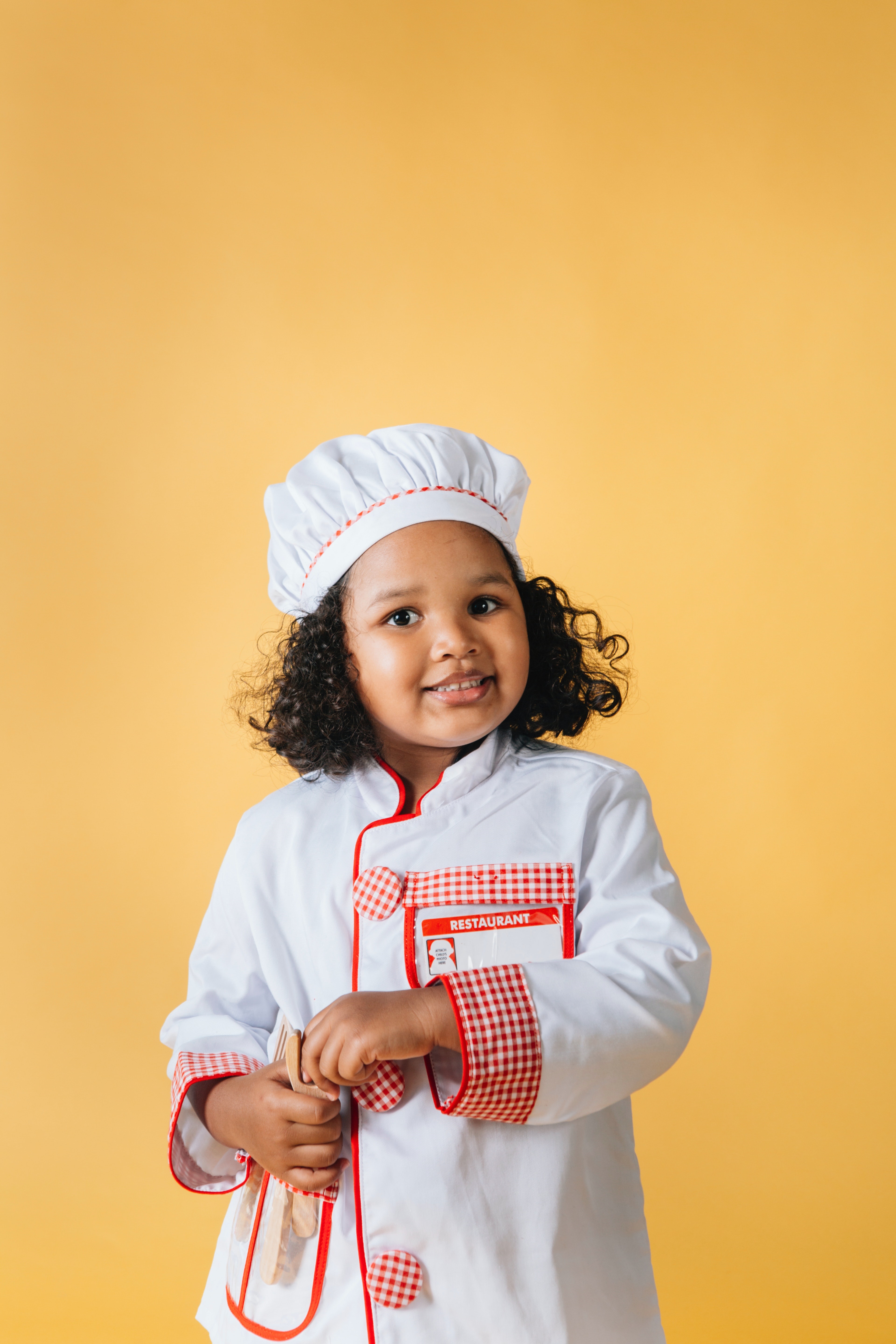Happy Girl In Chef Costume
