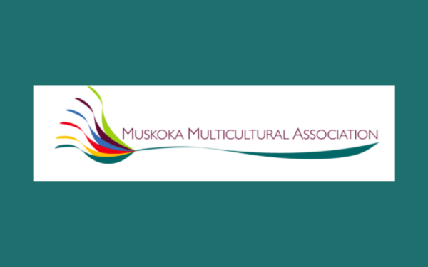 Spoon with many colours of spoon coming out of the bowl with the words Muskoka Multicultural Association