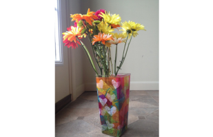 flowers in a stained glass vase