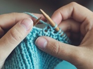 Two hands knitting