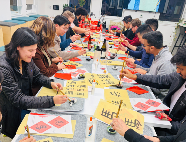 Image of people painting calligraphy