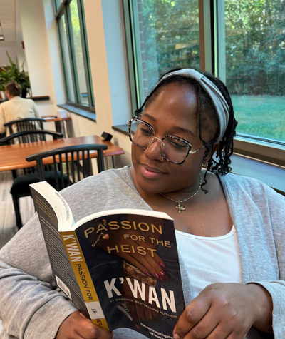 Staff holding The Buffalo Hunter by Stephen Graham Jones