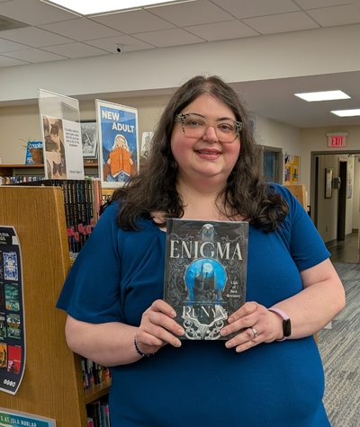 Staff holding The Buffalo Hunter by Stephen Graham Jones