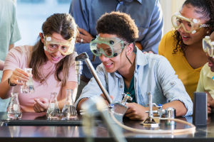 Group of teens in a science lab class.