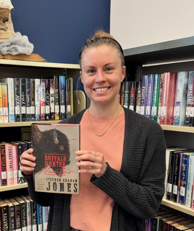 Staff holding The Buffalo Hunter by Stephen Graham Jones