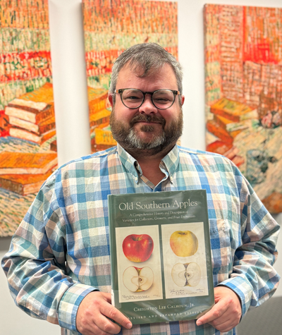 Staff holding The Buffalo Hunter by Stephen Graham Jones
