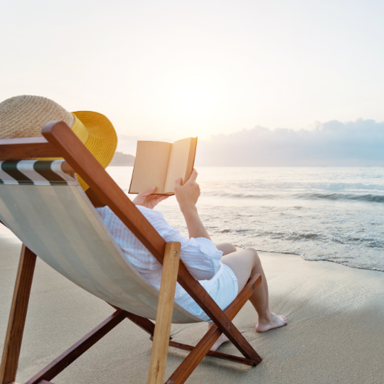Woman reading on the beach