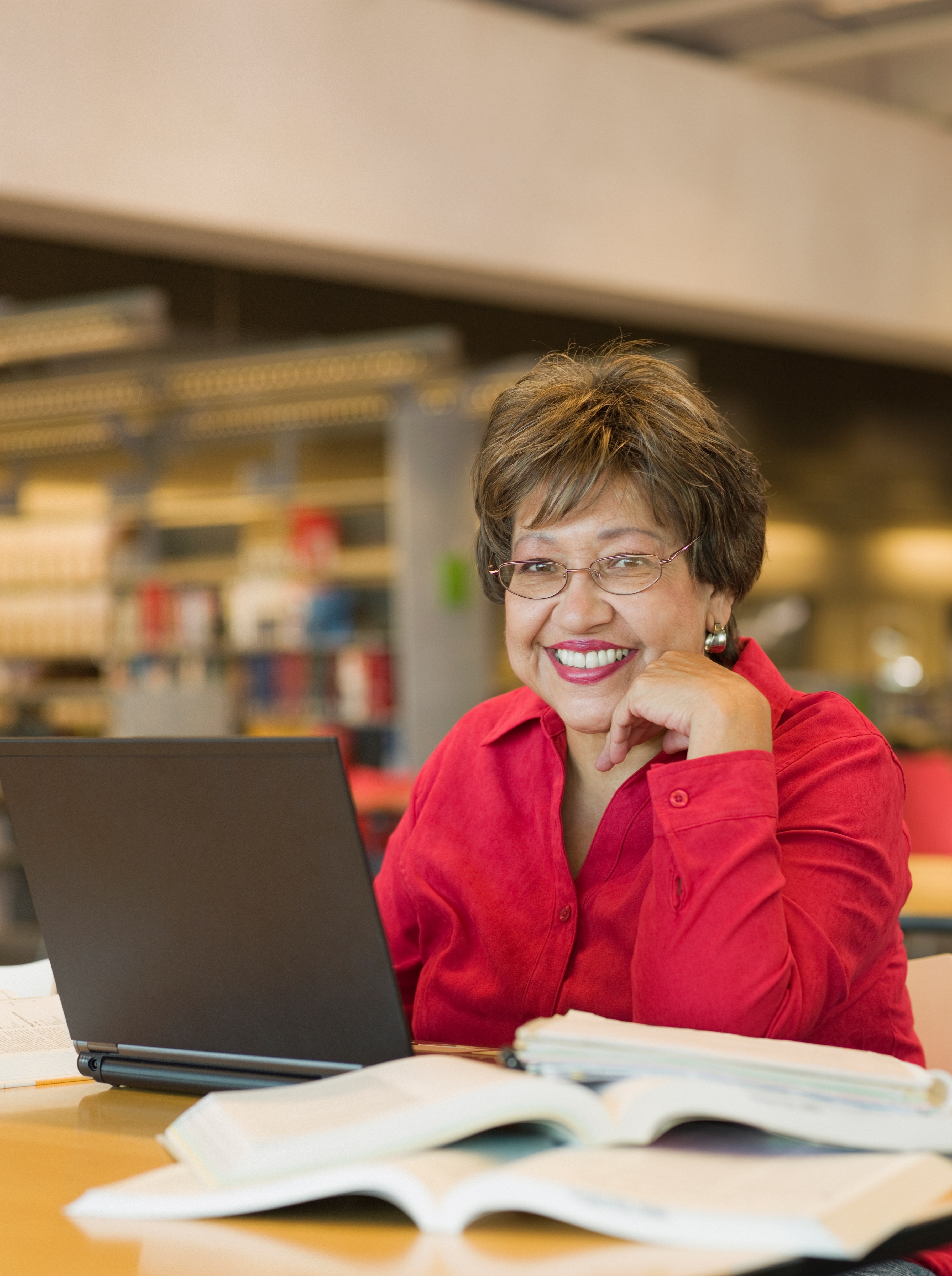 Senior Hispanic Woman Studying