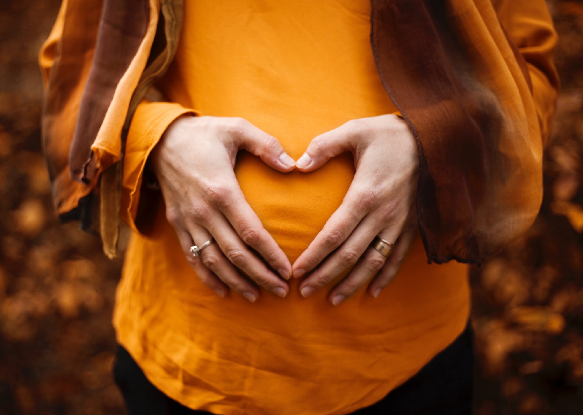 Hands Over Belly in Heart Shape