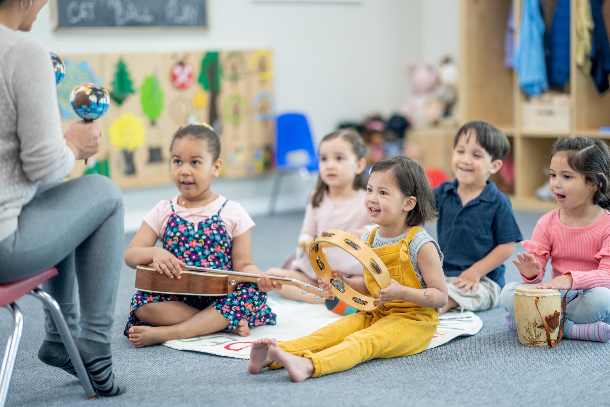 Group of Kids Attending Musical Storytime at the Library