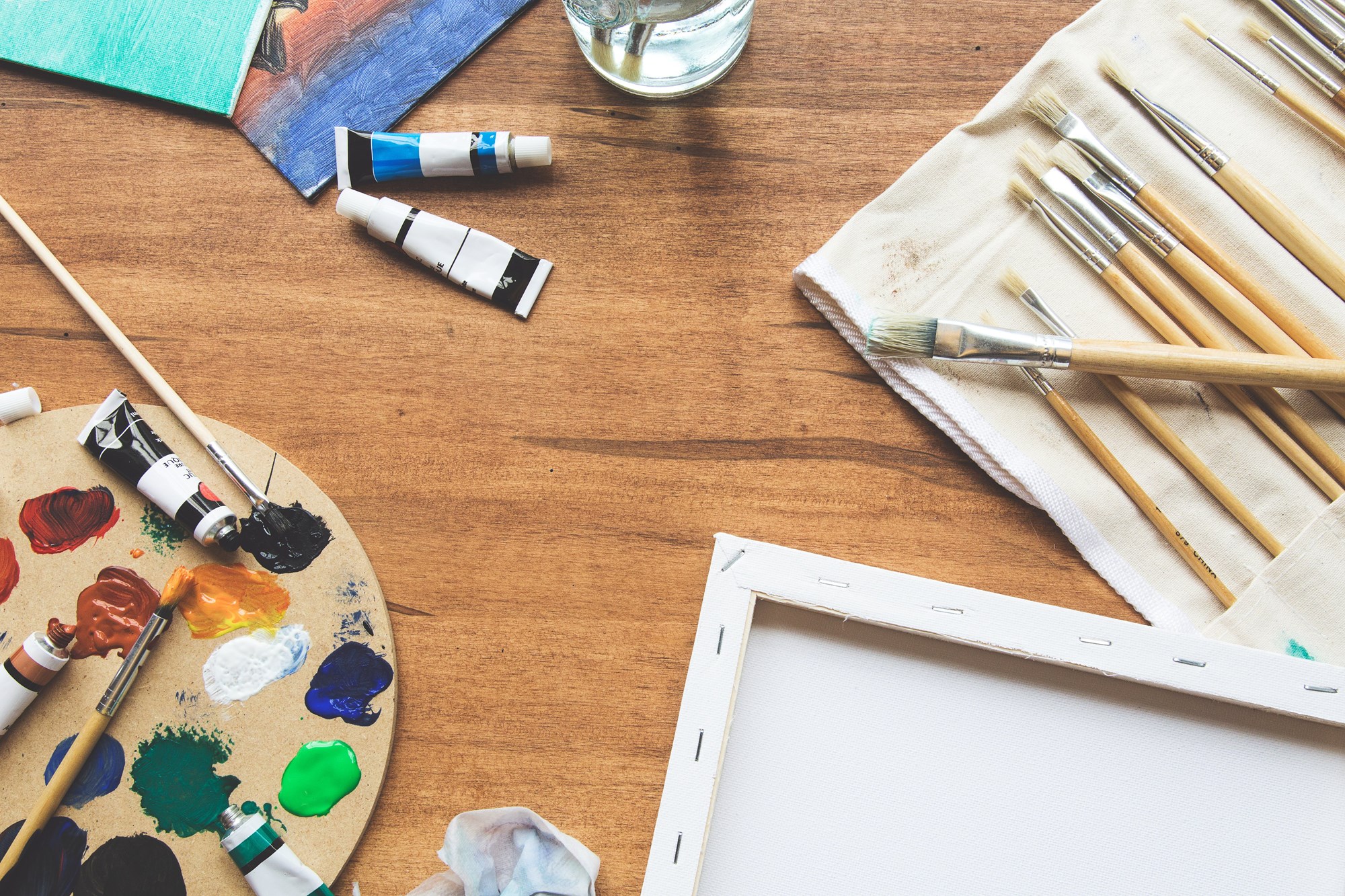Art Supplies on Wooden Table