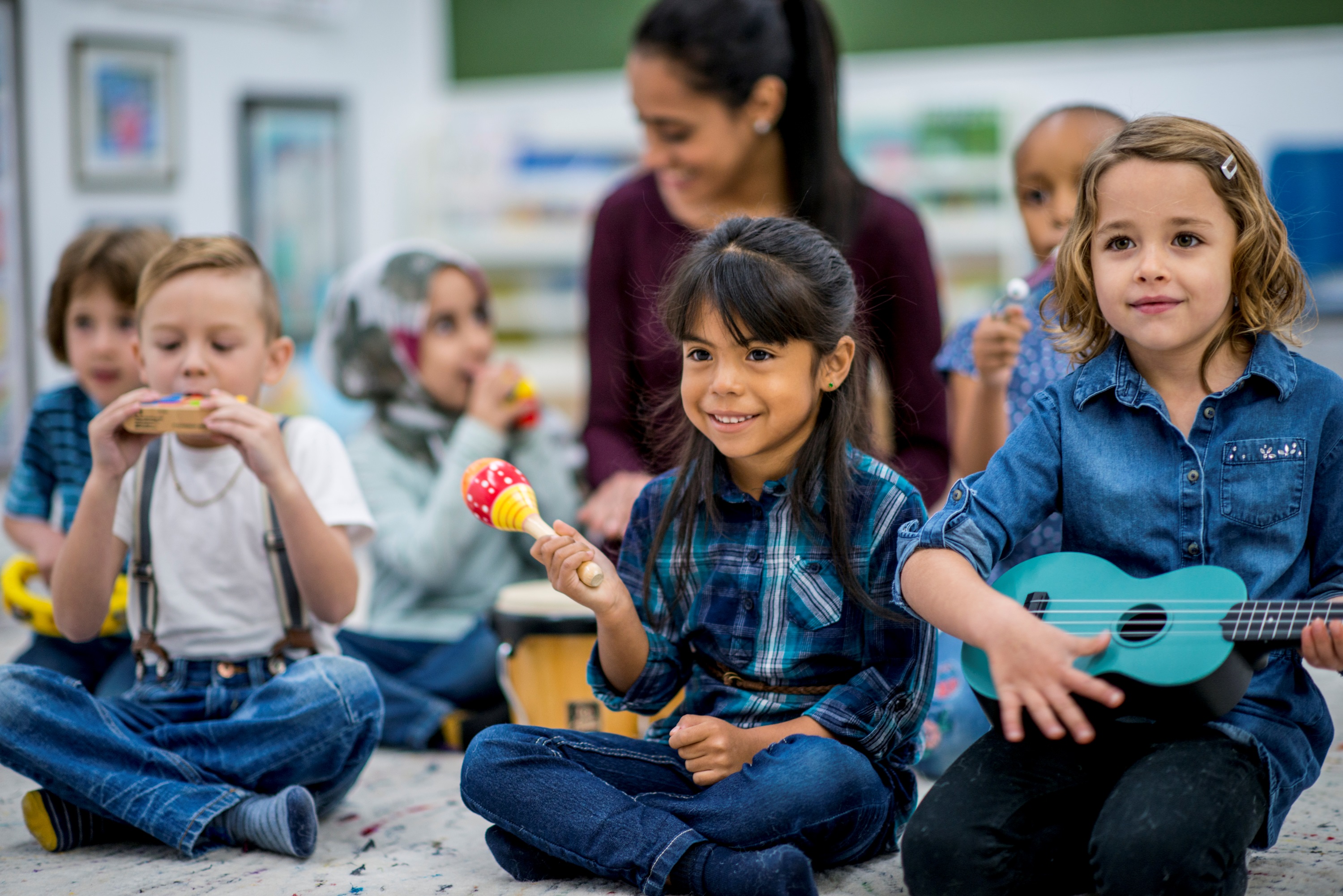 Group of School Children Playing Musical Instruments
