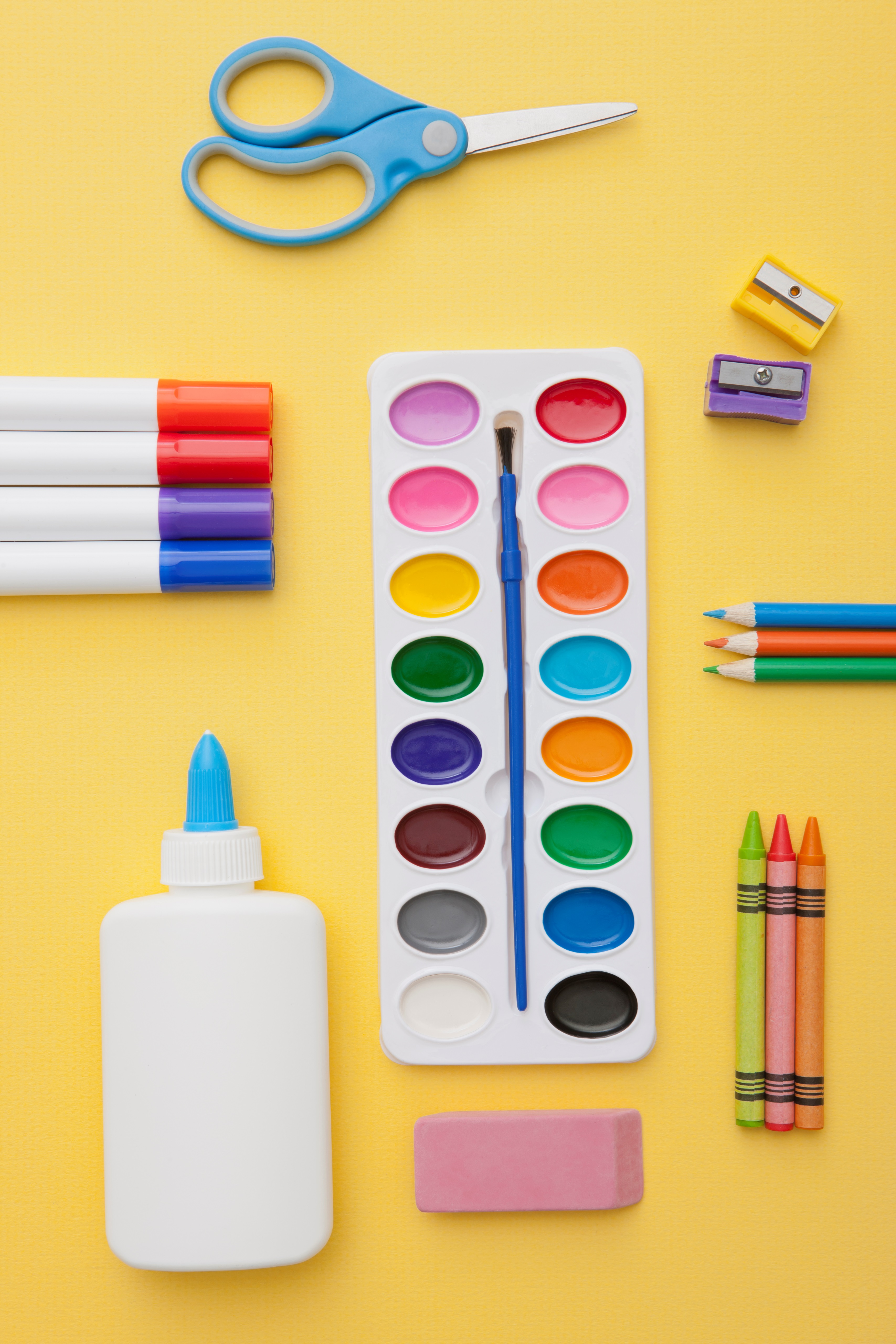 Arts and Crafts Supplies on Yellow Background