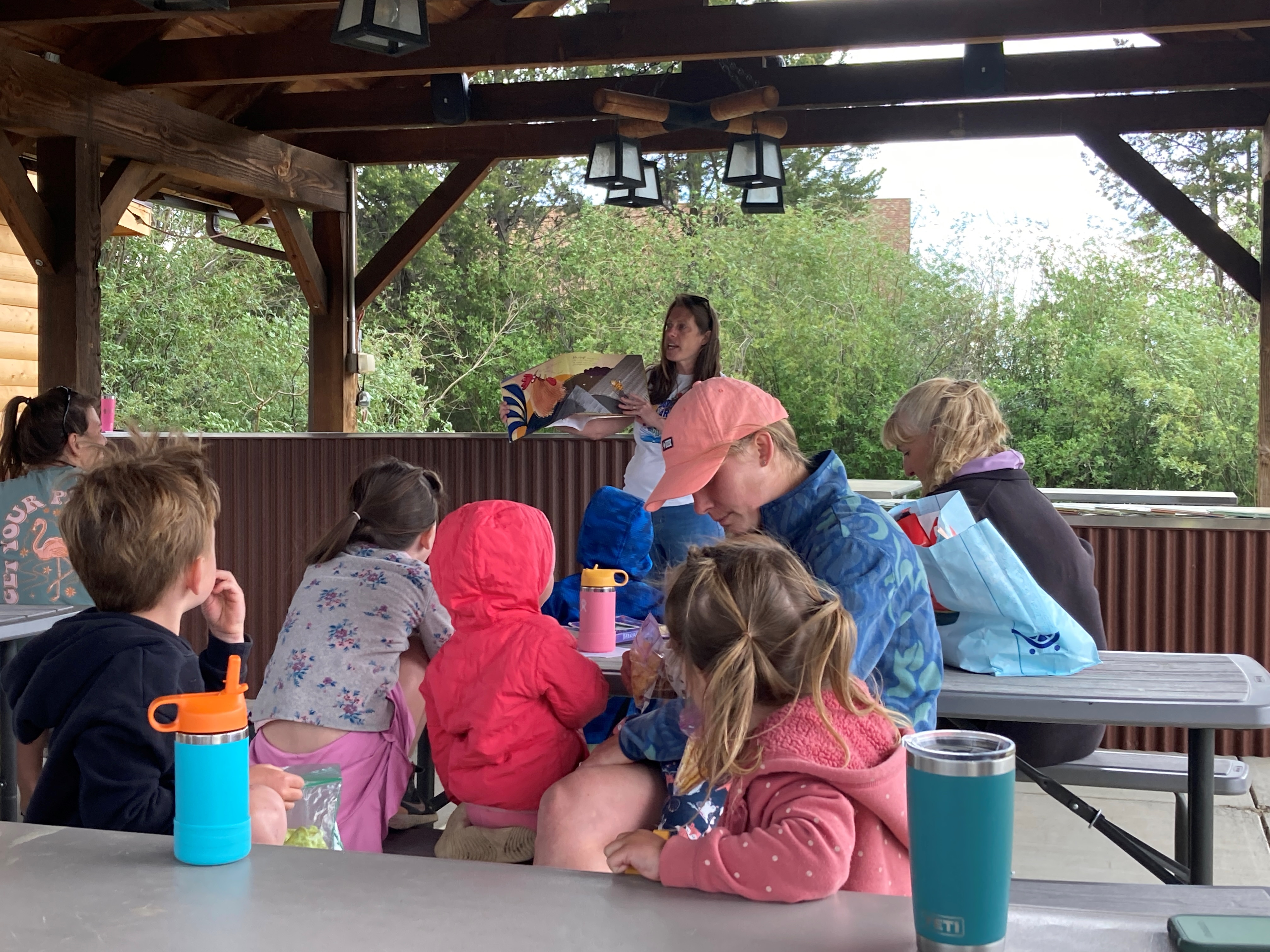 Group of paintballers on a mountaintop.