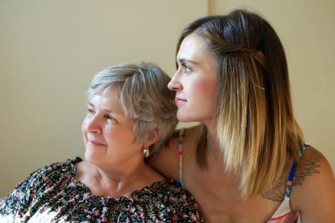 Elderly Mother and Daughter looking off into distance