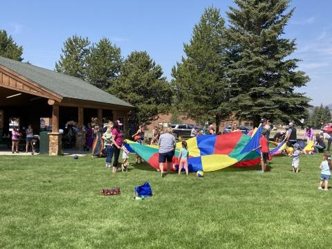 Families playing at an outdoor park
